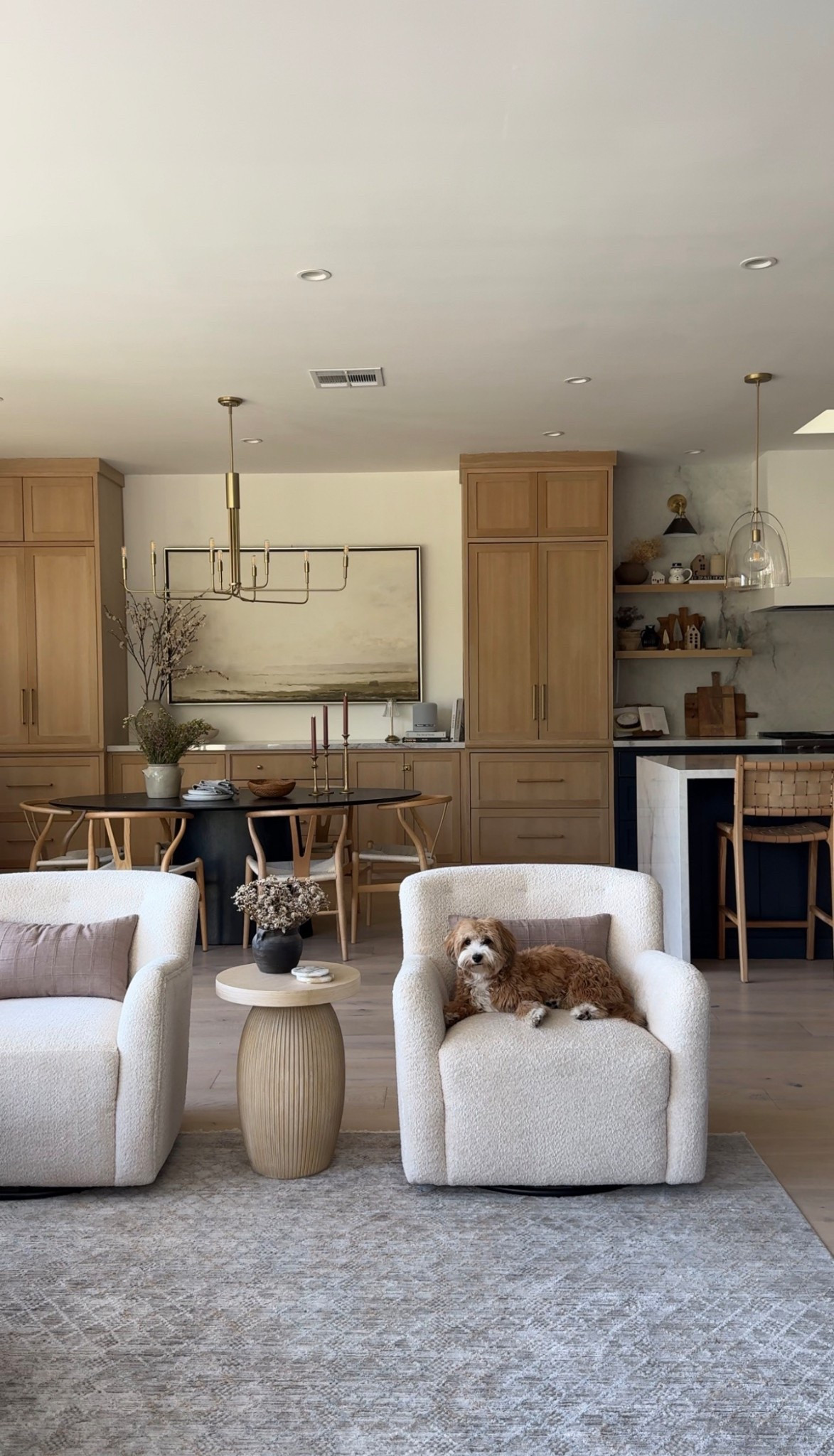 Open floor concept! Love these swivel chairs and this affordable chandelier looks so luxe 

#LTKHome #LTKSaleAlert
