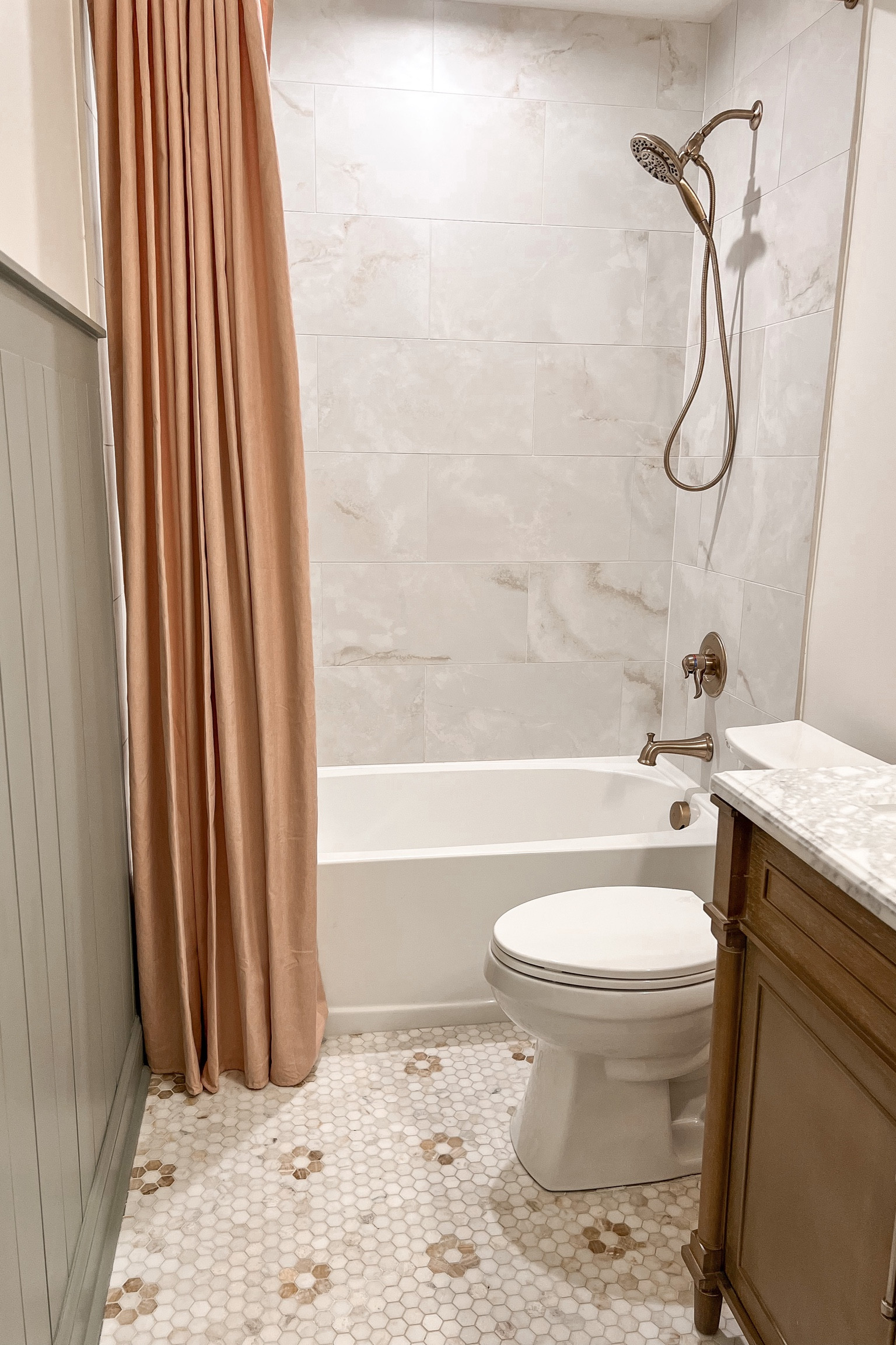 Bathroom remodel, blush linen shower curtain, champagne bronze tub and shower faucet, marble bath, Evergreen Fog accent wall 

#LTKfamily #LTKhome #LTKunder50