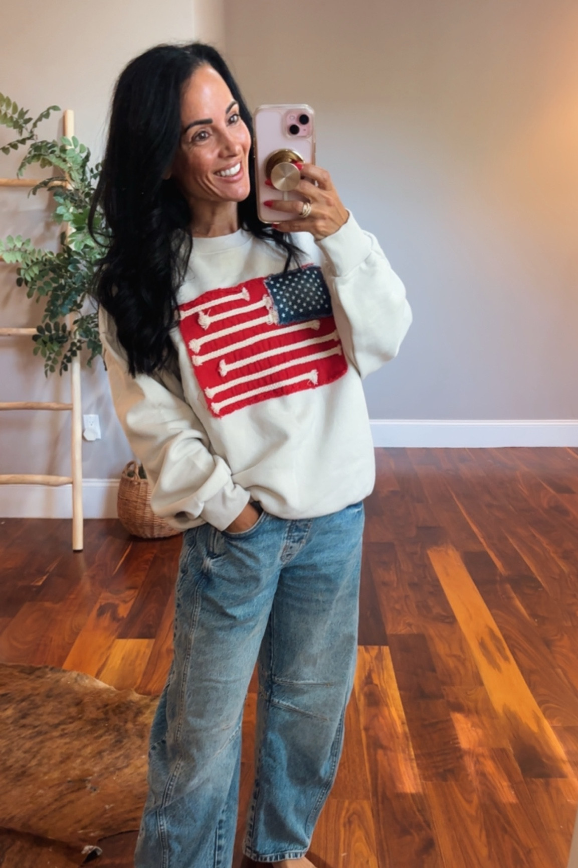 American flag sweatshirt paired with barrel jeans


#LTKootd #LTKSeasonal #LTKOver40