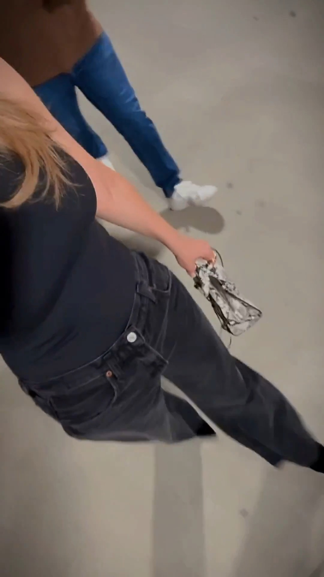 Another Miami Heat game outfit: I’m wearing a black sleeveless bodysuit from Aritizia w Low Curve jeans from Agolde in black tar. My bag 🤍 is a white snake print top handle bag from Balenciaga.

#LTKSaleAlert #LTKdayinmylife #LTKootd