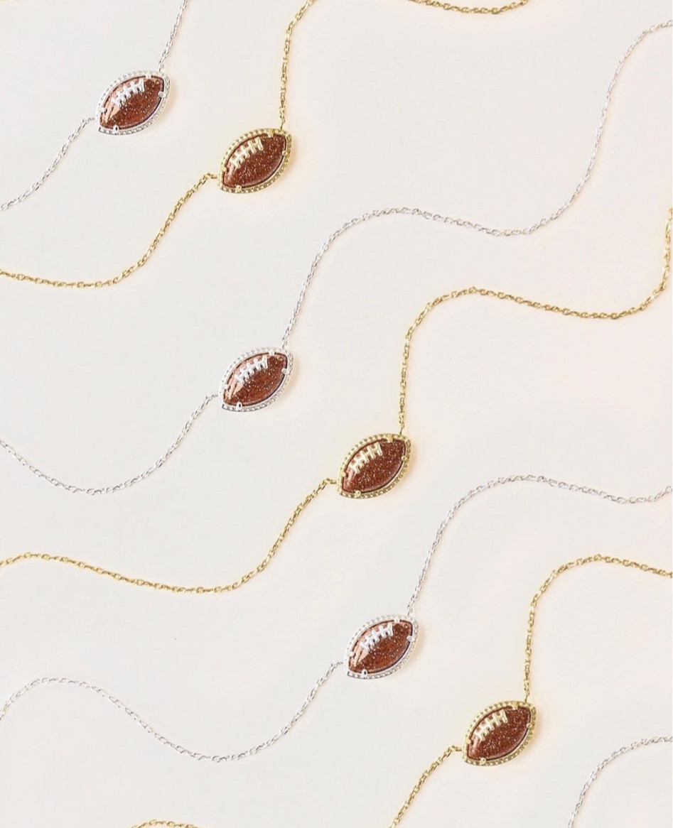 Kendra Scott football necklace i’m gold and silver!! 🏈✨

#LTKfindsunder100 #LTKSeasonal #LTKstyletip
