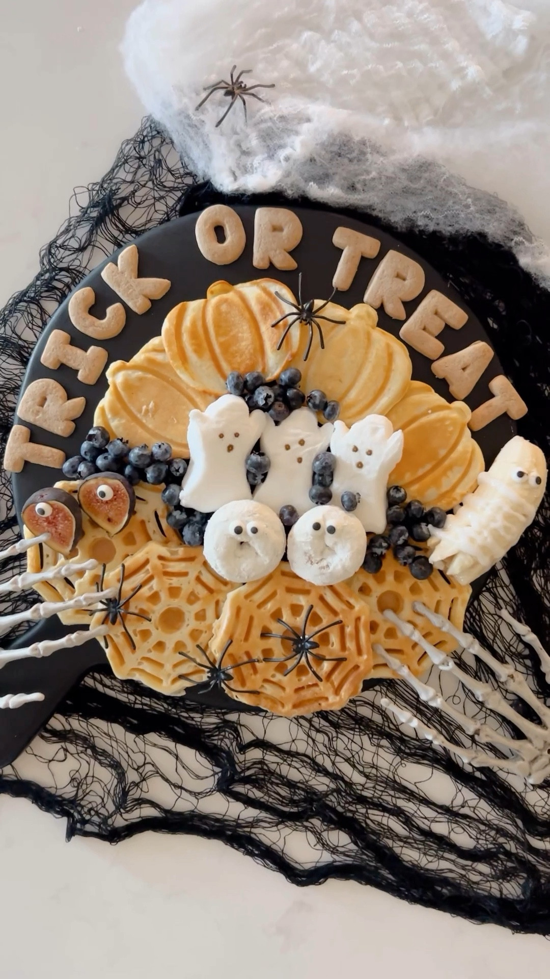 
I’m so excited to start surprising my kids with Halloween breakfasts this year! 👻✨
I found the TRICK OR TREAT letters at Trader Joe’s 🛒, made pumpkin + spiderweb waffles, added ghost marshmallows, mini donuts, and even figs with little candy eyes 👀 they turned out so spooky + cute! 🕷️🍂
This would be perfect for a Halloween morning, fall brunch, or even a cozy October weekend breakfast!

Use themed plates or trays to give it that spooky glow up your family will love!

#halloweendecor #spookyseason #halloweentreats #halloweenfood #fallvibes #fallbreakfast #halloweenideas #diyhalloween #halloweeniscoming #halloweeninspo #cozyhalloween #spookybreakfast