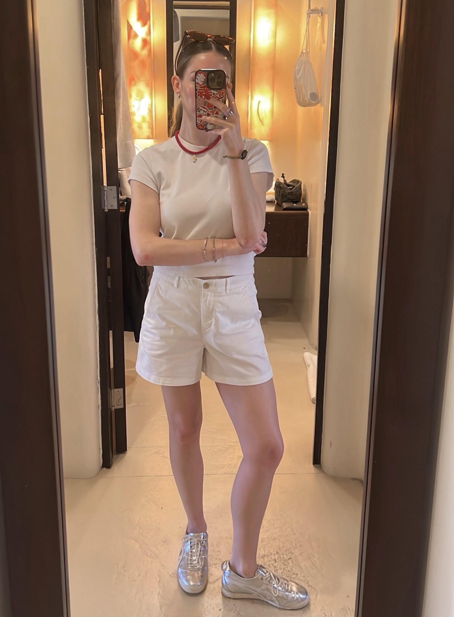 The perfect white tee from Uniqlo- wearing a small 

White shorts / chin shorts - runs big size down 

Onitsuka tennis shoes / silver tennis shoes - run true to size 
Ray can sunglasses / cat eye sunglasses 

#LTKShoeCrush #LTKTravel #LTKFindsUnder100
