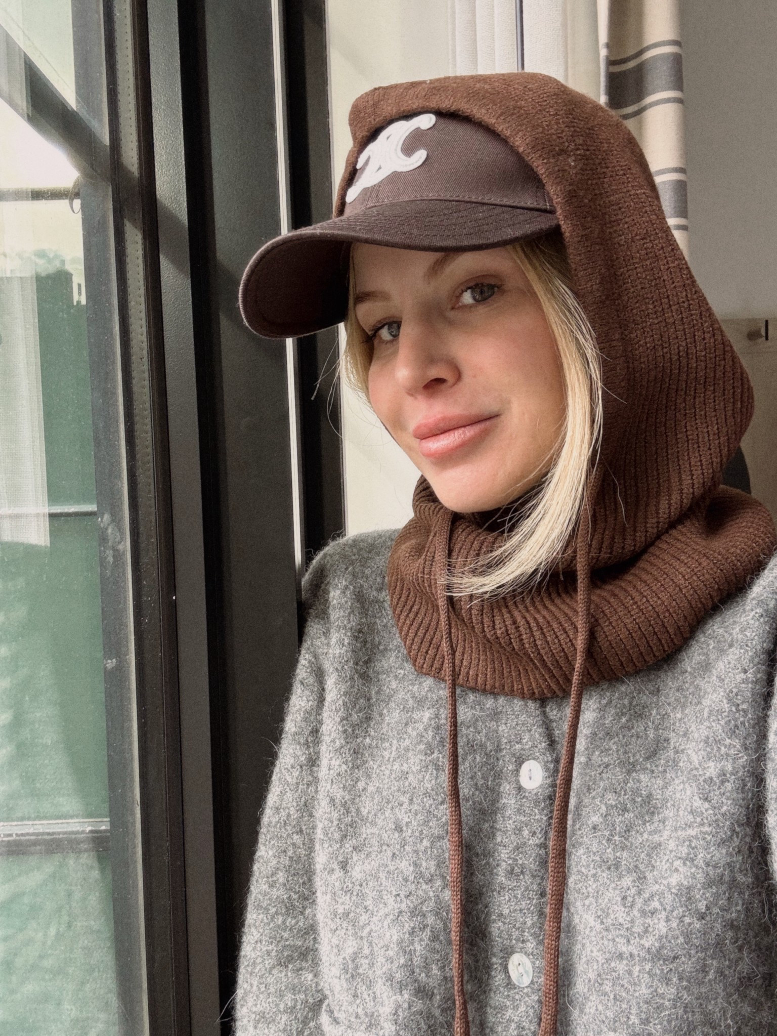 Balaclava and baseball cap combo 

#LTKootd #LTKOver40 #LTKTravel