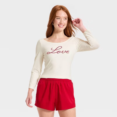 Women's Slim Fit Long Sleeve Valentine's Day Graphic Boat Neck T-Shirt - Universal Thread™ Cream XL | Target