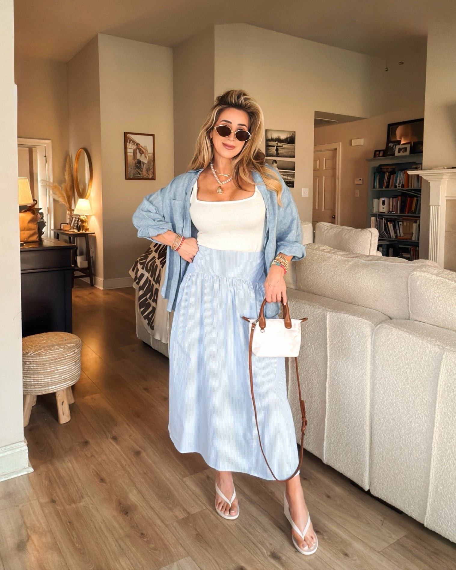 Easy blue stripe midi skirt with smocked back for a casual summer outfit idea. 

Summer outfits, vacation outfits, sandals, crossbody mini tote bag, sandals

#LTKootd #LTKOver40 #LTKPetite