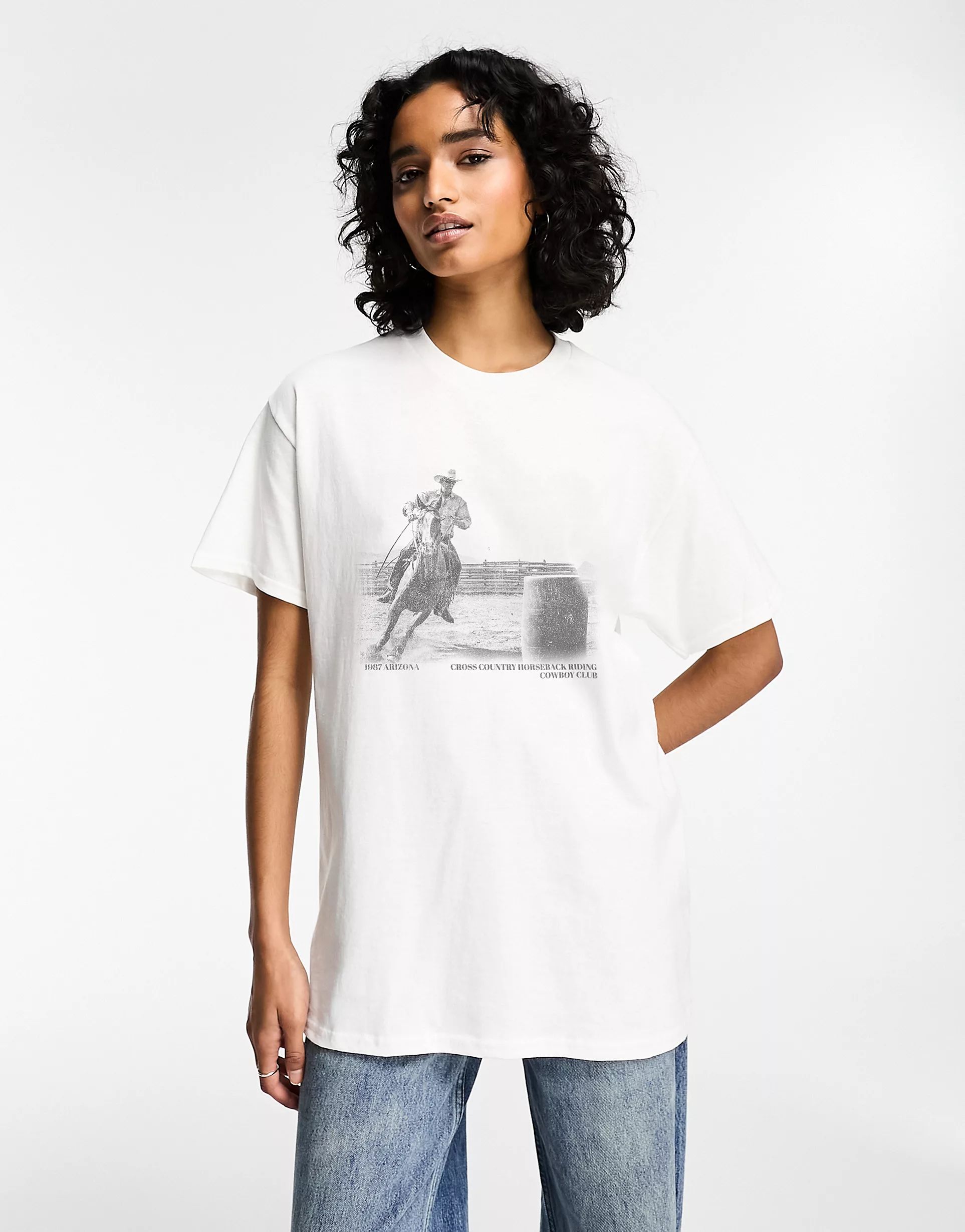 ASOS DESIGN oversized t-shirt with horseback riding cow boy graphic in white | ASOS (Global)
