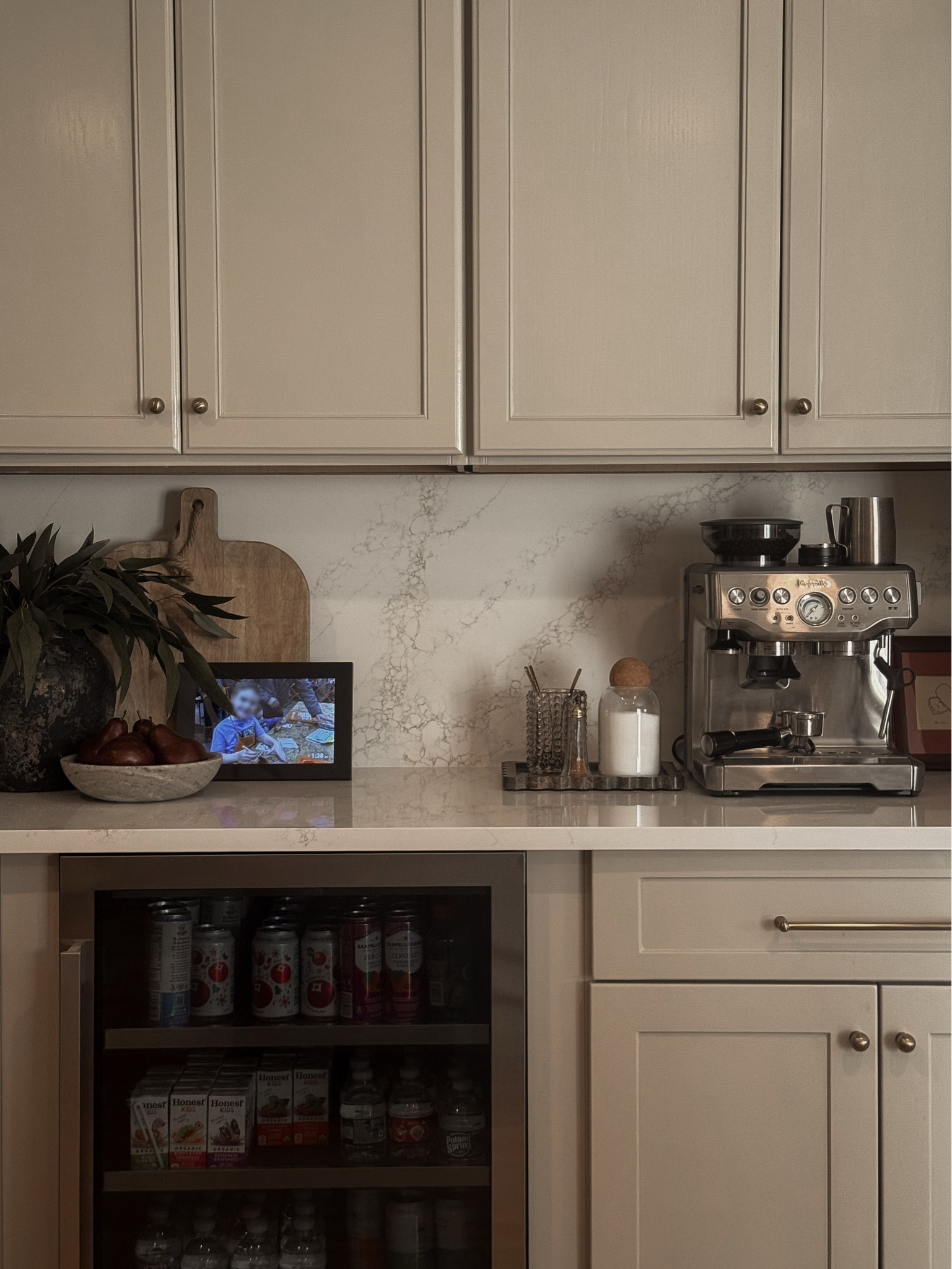 Cabinet color: Accessible Beige by Sherwin Williams 

￼Kitchen counter decor, mini fridge, espresso machine, coffee machine, digital art frame, faux spring stems, 
Spring decor, kitchen counter styling ￼

#LTKHome