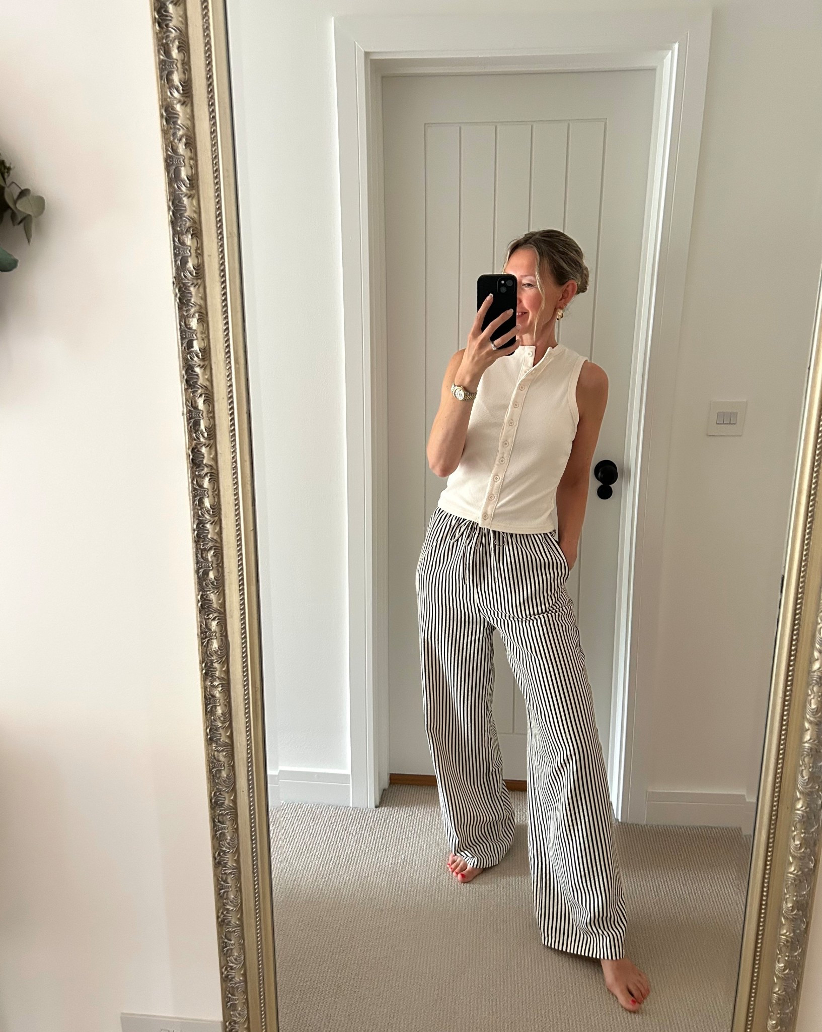 What I wore yesterday 

Striped trousers, button top 