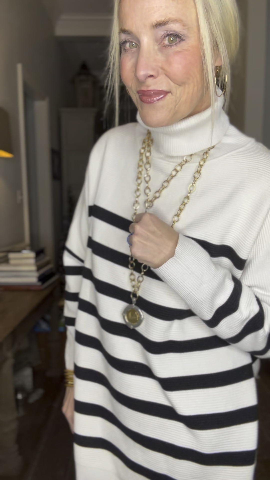 I’m channeling cozy-chic vibes today in this effortless outfit of the day. This look embraces the timeless allure of stripes with this oversized sweater and sleek black skinny jeans for a modern edge. And can we talk about these fabulous boots?!? Comfort meets trend at its finest and proving that once again, age is just a number when it comes to fashion. 

I’m in a medium in the Free People look for less sweater and an 8 in the high-waisted jeggings. This exact style of pants from American Eagle is no longer available, but I linked the newest version for you. 
#LTKTreatYourself

#LTKplussize #LTKmidsize #LTKover40