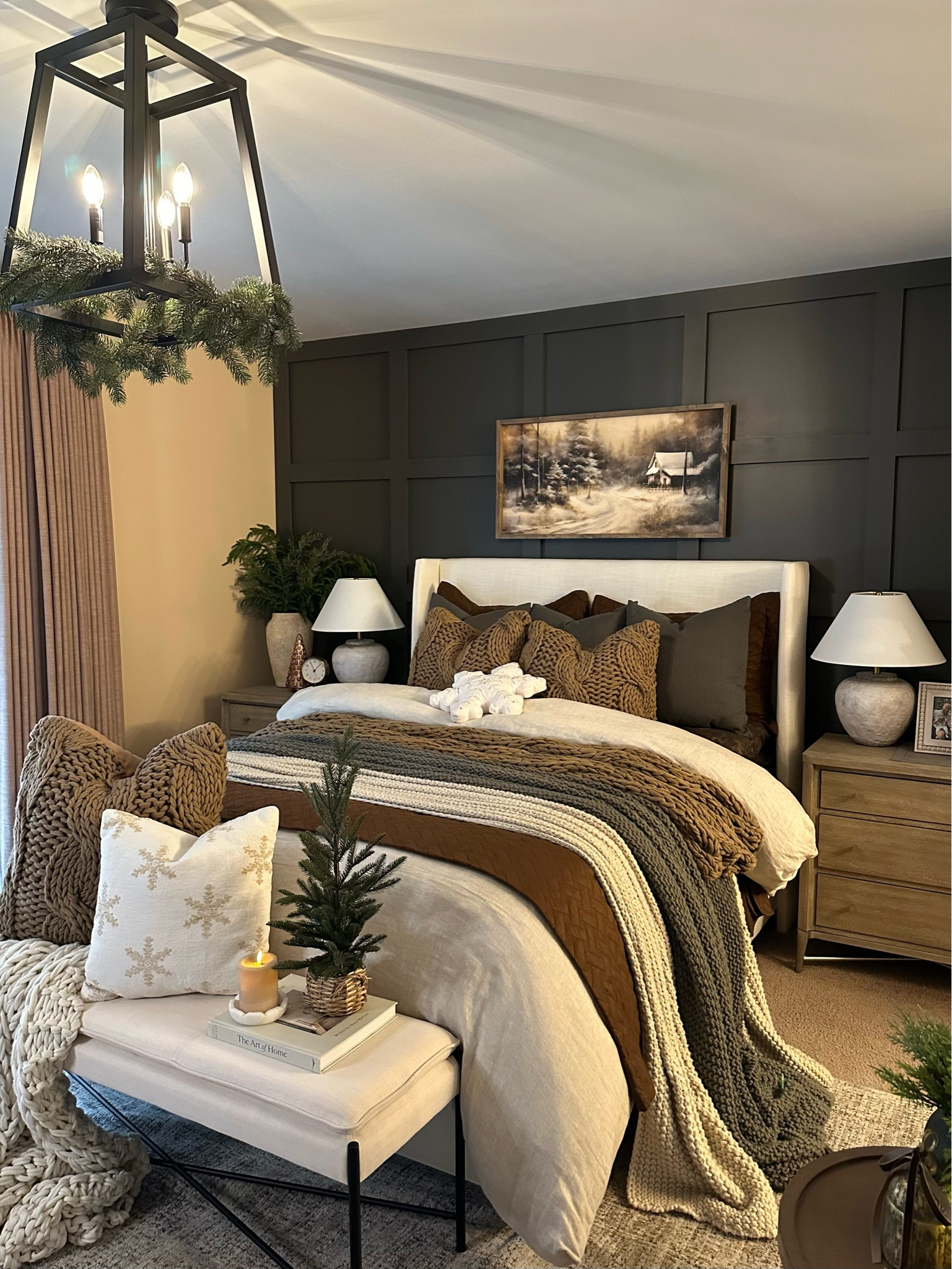 ✨Cozy Winter Bedroom. Follow @farmtotablecreations on Instagram for more inspiration.

I absolutely love this gorgeous 20x40 Tranquil Winter Scene canvas printed art and I’m so amazed at how well it ties this entire space together. It was my inspiration for my bedroom and I couldn’t be more pleased. Use code FARMTOTABLE for 15% off artwork  

I’ve layered up with chunky throws and knitted pillows that add warmth and texture, adding to the extra snuggly feel.

To elevate the cozy charm, I’ve adorned each nightstand with tall, slender vases brimming with faux stems, and nestled beside them are delightful bronze-colored trees that add a touch of sparkle! ✨ 

#LTKSaleAlert #LTKFindsUnder50 #LTKHome