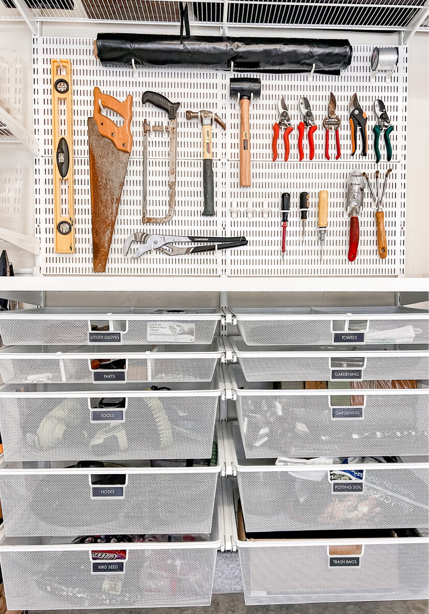 Got tools? The Elfa system comes with so many accessories to hang and display your tools making them easy to find and quickly grab! They go well in this workshop station complete with a work surface table and drawers underneath for extra storage.

#LTKhome #LTKSeasonal #LTKFind