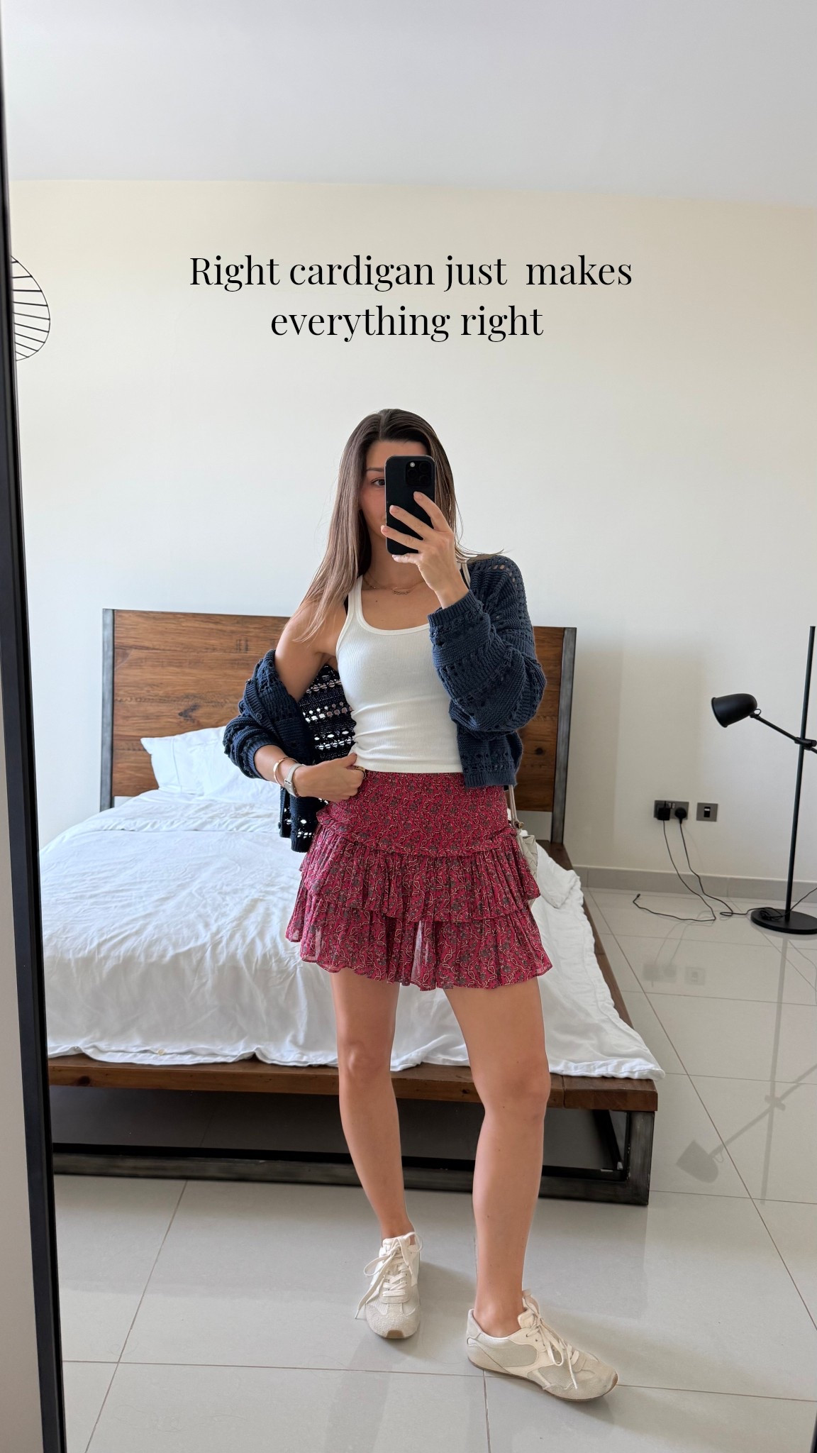 Whenever the outfit is not paired with a top layer , in a right combo, you will miss out or will avoid wearing the item. To me, my cover ups are the way to go through all spring and summer time.

Red ruffle mini skirt, tank top, white sneaker, Miu Miu dupe sneaker, navy cardigan, open knit jumper 

#LTKootd #LTKmomlife