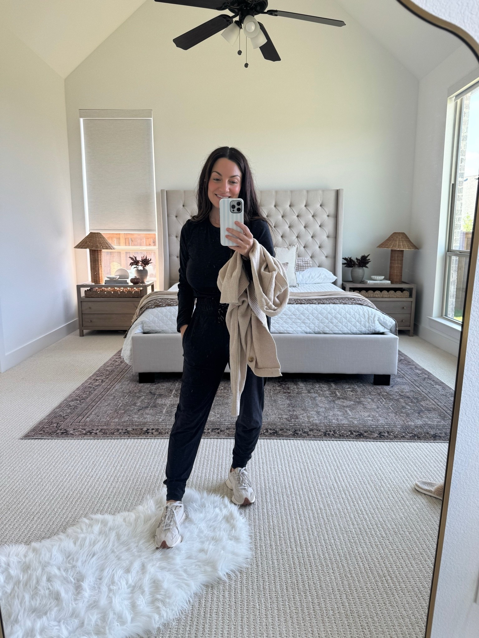 The kind of comfy fall outfit you’ll want to wear on repeat! This black matching lounge set is such an easy everyday outfit for fall, whether you’re heading to school drop-off, running errands, grabbing coffee, traveling, or just wanting something comfortable that still looks put together. I styled the black long sleeve top and jogger pants with neutral sneakers for a casual athleisure look, and added a cozy beige cardigan for an extra layer on cooler mornings. Such a versatile outfit idea for fall travel, airport outfits, weekend casual wear, and everyday mom style. Sharing all the outfit details and similar fall wardrobe essentials! @Kohl's