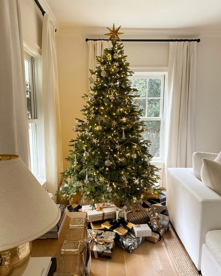 Kat Jamieson shares her Christmas tree. Ornaments, holiday decor, living room, home, garland, tree topper, festive. Curtains are Restoration Hardware Belgian linen.

#LTKSeasonal #LTKHoliday #LTKhome