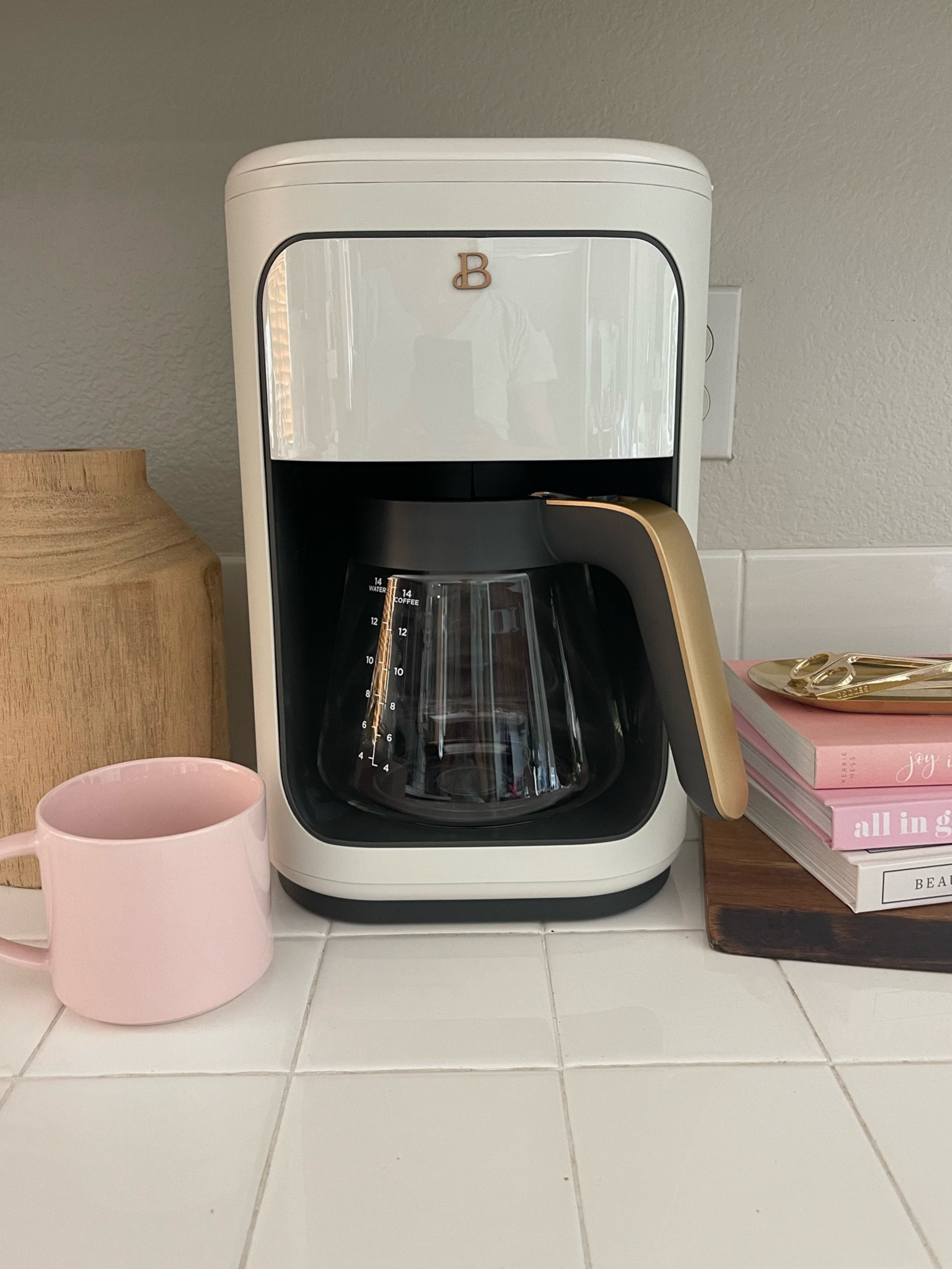Coffee Nook ☕️

White coffee maker, coffee maker, coffee mug, cutting board, books, decor books, pink book, wooden vase, candle accessories.

#LTKFindsUnder100 #LTKFindsUnder50 #LTKHome