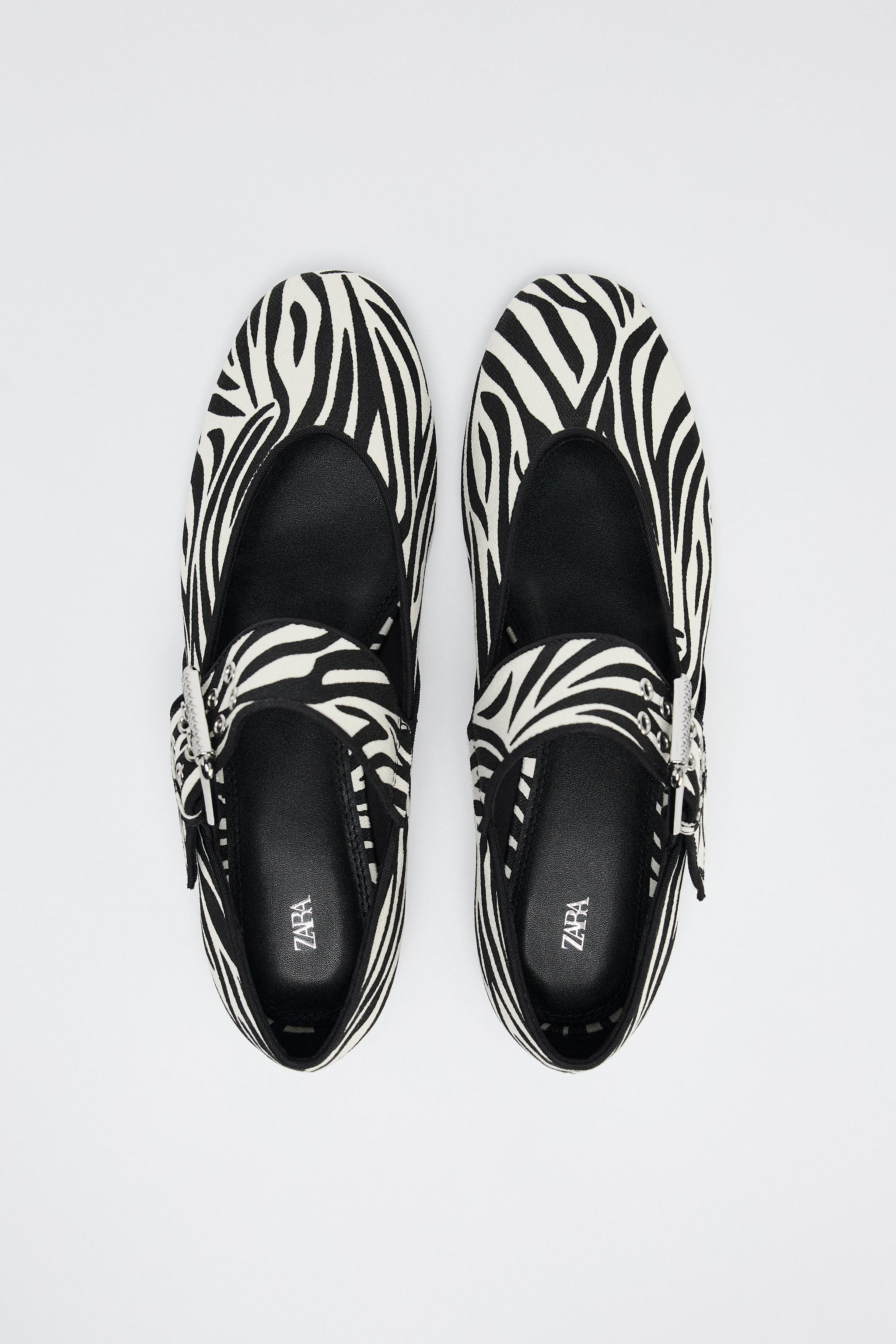Animal print ballet flats. Buckled strap closure. Rounded toe.Sole height: 0.4 inches (1 cm)Zebra... | Zara US