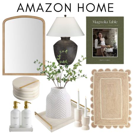 Amazon Home! 
Mirror 
Table lamp 
New magnolia book 
White vase 
Coasters 
Soap dispensers 
Neutral scalloped rug 
Leather tray 
White candle holders 

#LTKhome #LTKFind