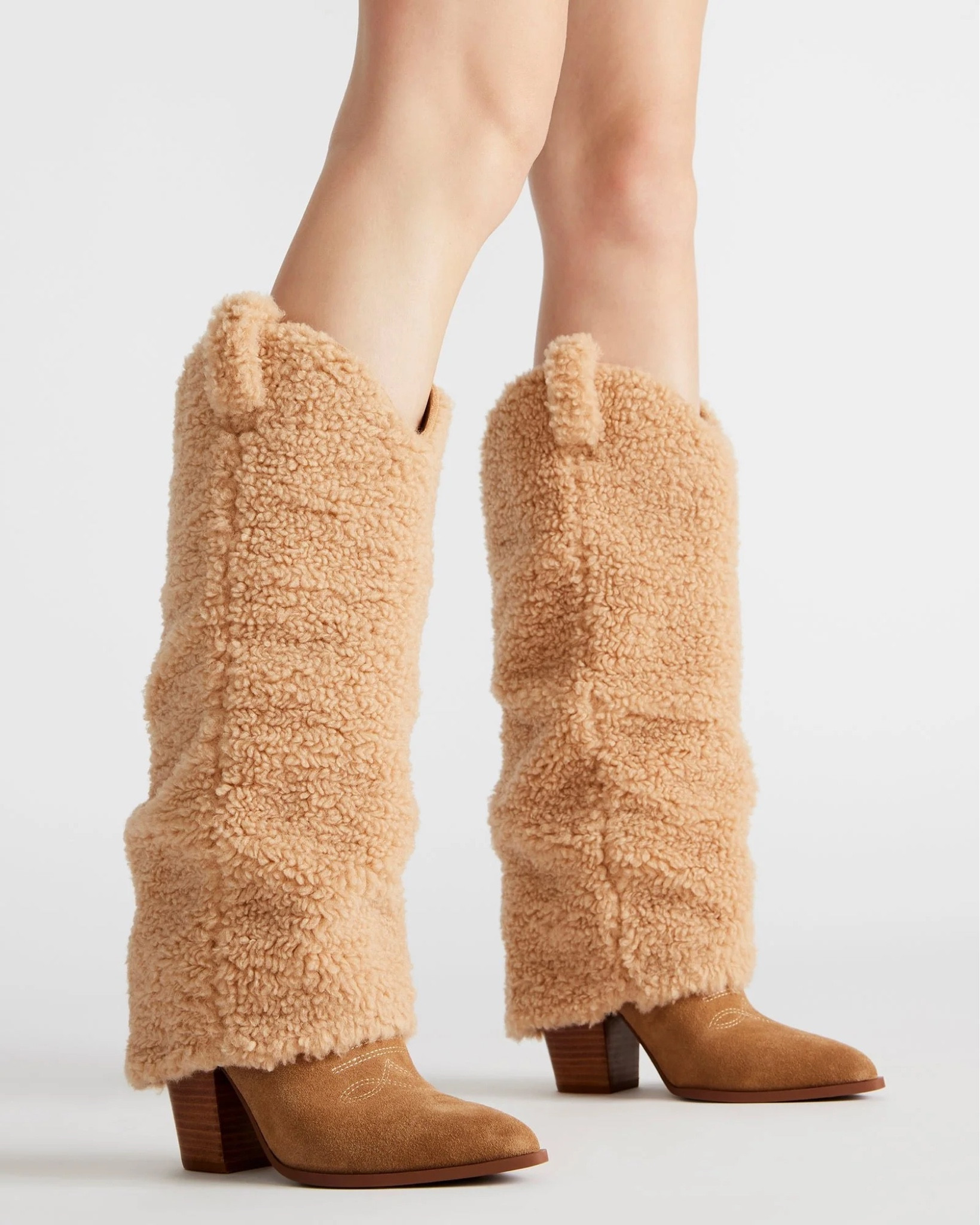 Steve madden Decorative stitching and faux fur accents give the LASSY knee boots a Western edge with a point toe and an angled heel to complete the theme. The foldover construction adds a slouchy style to these knee high boots.

#LTKCyberWeek #LTKHoliday #LTKSeasonal