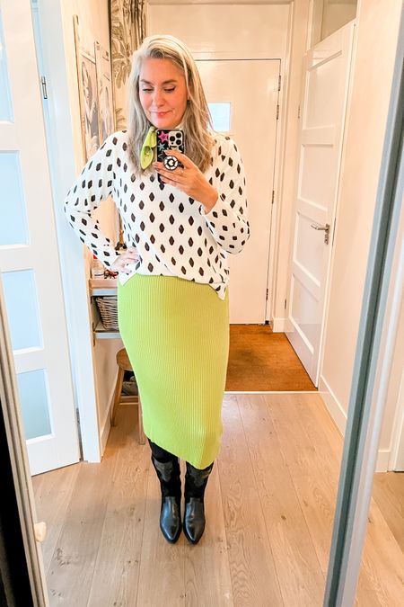 Ootd. A black and white jumper paired with chartreuse knitted midi skirt, tights and western boots. 



#LTKover40 #LTKworkwear #LTKmidsize