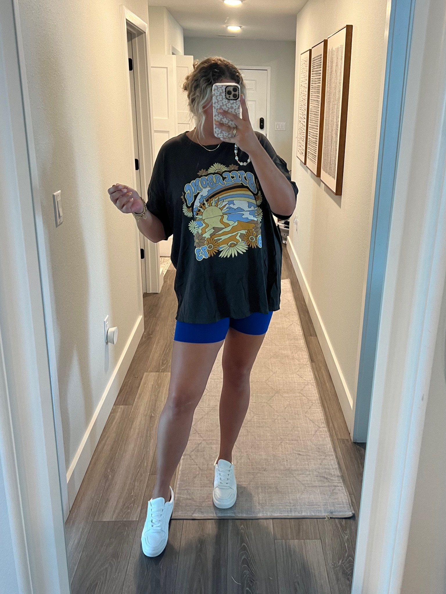 This is actually a onesie, but I threw on an oversized graphic tee over it to give it a biker shirt look. So cute and comfy and perfect for summer! 

#LTKcurves #LTKshoecrush #LTKxNSale