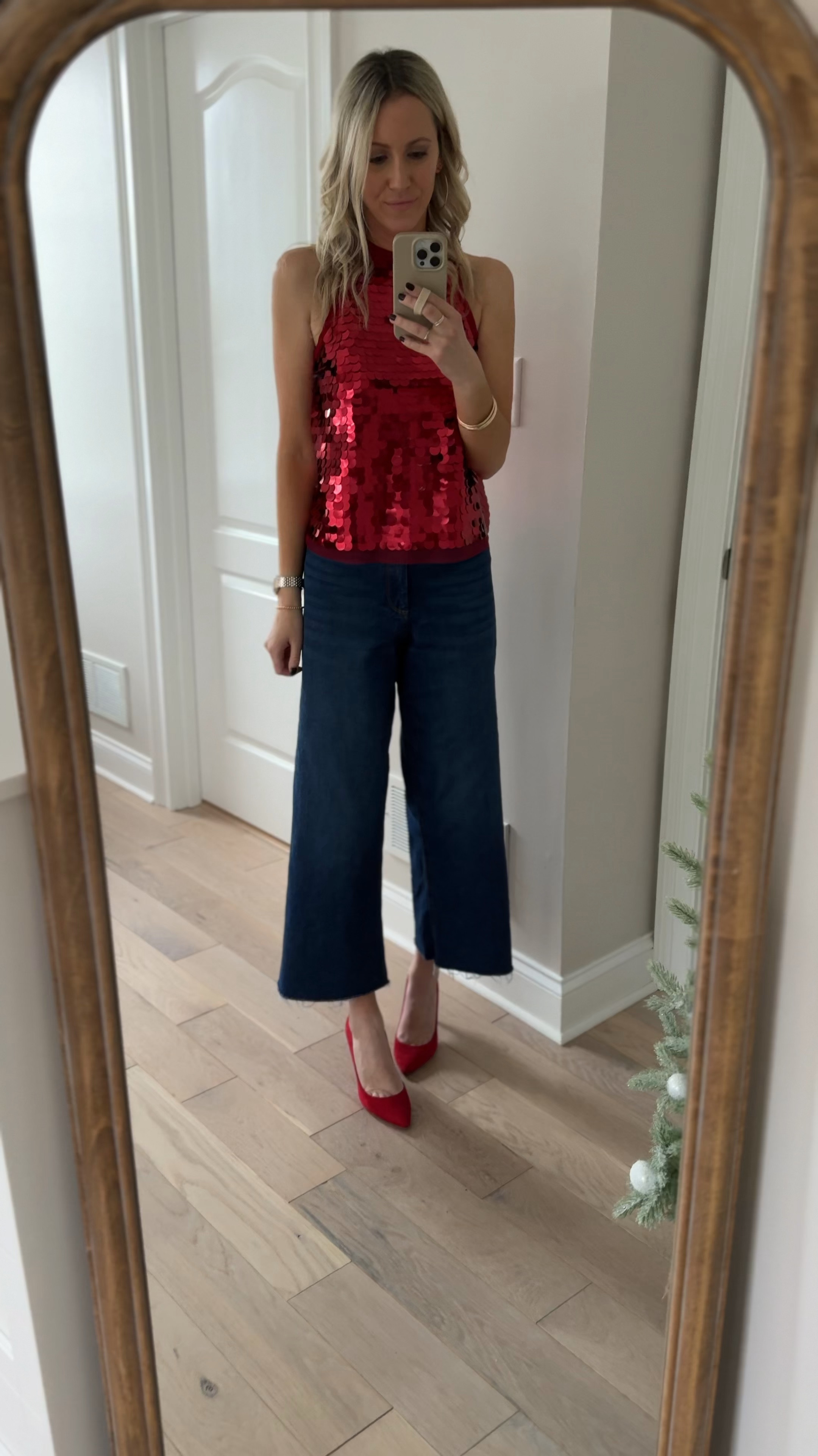 Sequin outfit for the holidays! Perfect for NYE, too! I’m wearing xs in the sparkle top and my true size in these viral wide leg jeans. I’m 5’7”. 

#LTKHoliday #LTKParties #LTKWatchNow