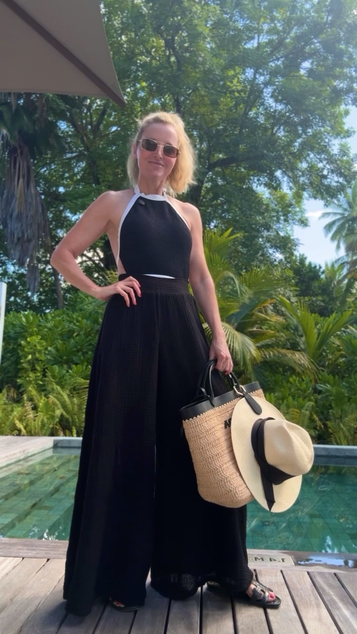 I’m not sure how I stumbled upon this gem of a one-piece by Free People, but I’m so glad I did! It offers rare, incredible coverage in both the front and back while remaining flattering and absolutely gorgeous.

The halter neckline adds a touch of timeless elegance, and the white tie waist belt helps define your shape, making it even more flattering. Plus, the classic black-and-white color combination pairs effortlessly with everything in your beach capsule and feels so much more luxe than a brightly-colored suit.

True to size. 

~Erin xo 

#LTKSwim #LTKTravel #LTKSeasonal