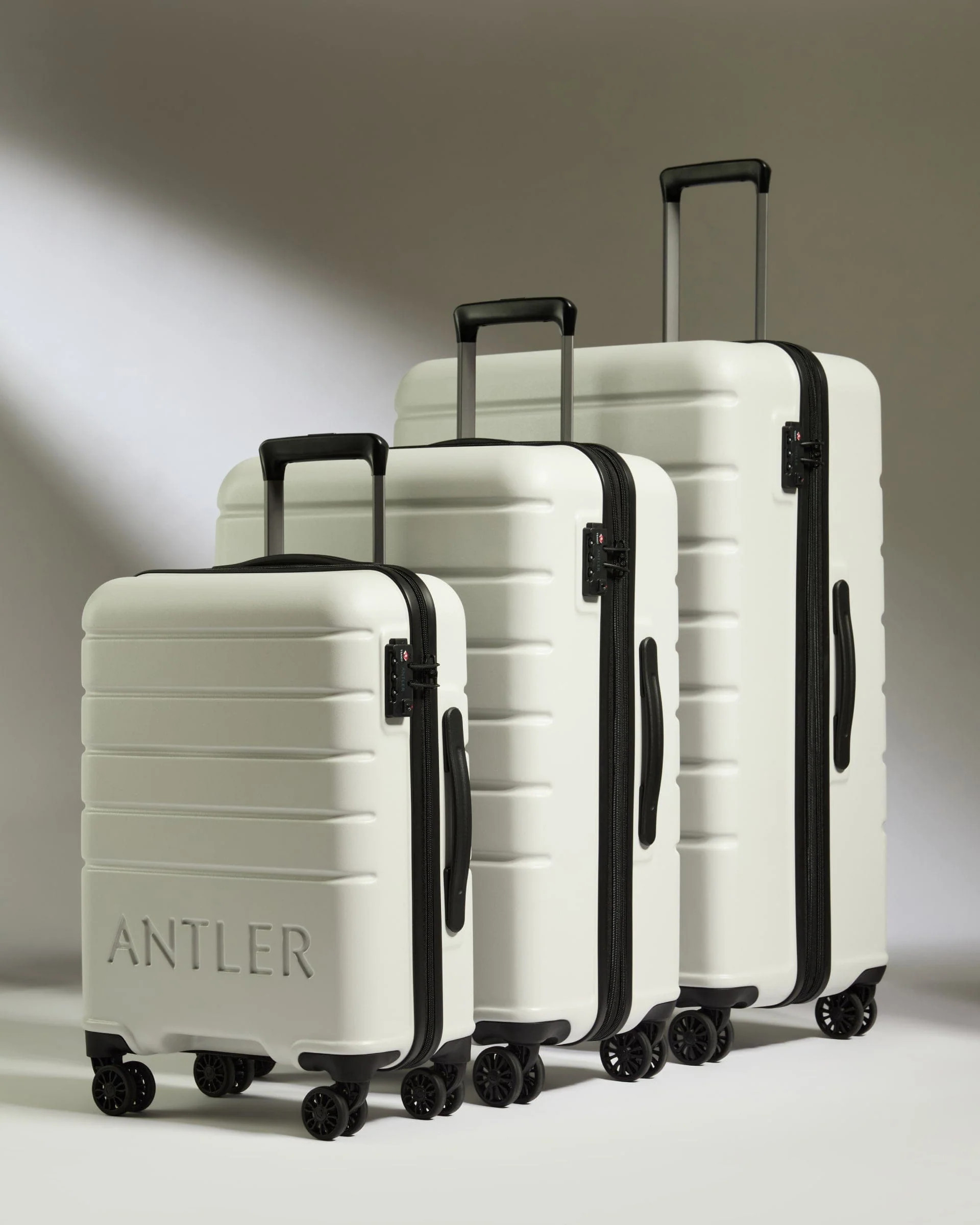 Set of 3 Suitcases White - Logo | Lightweight Hard Shell Luggage | Antler UK