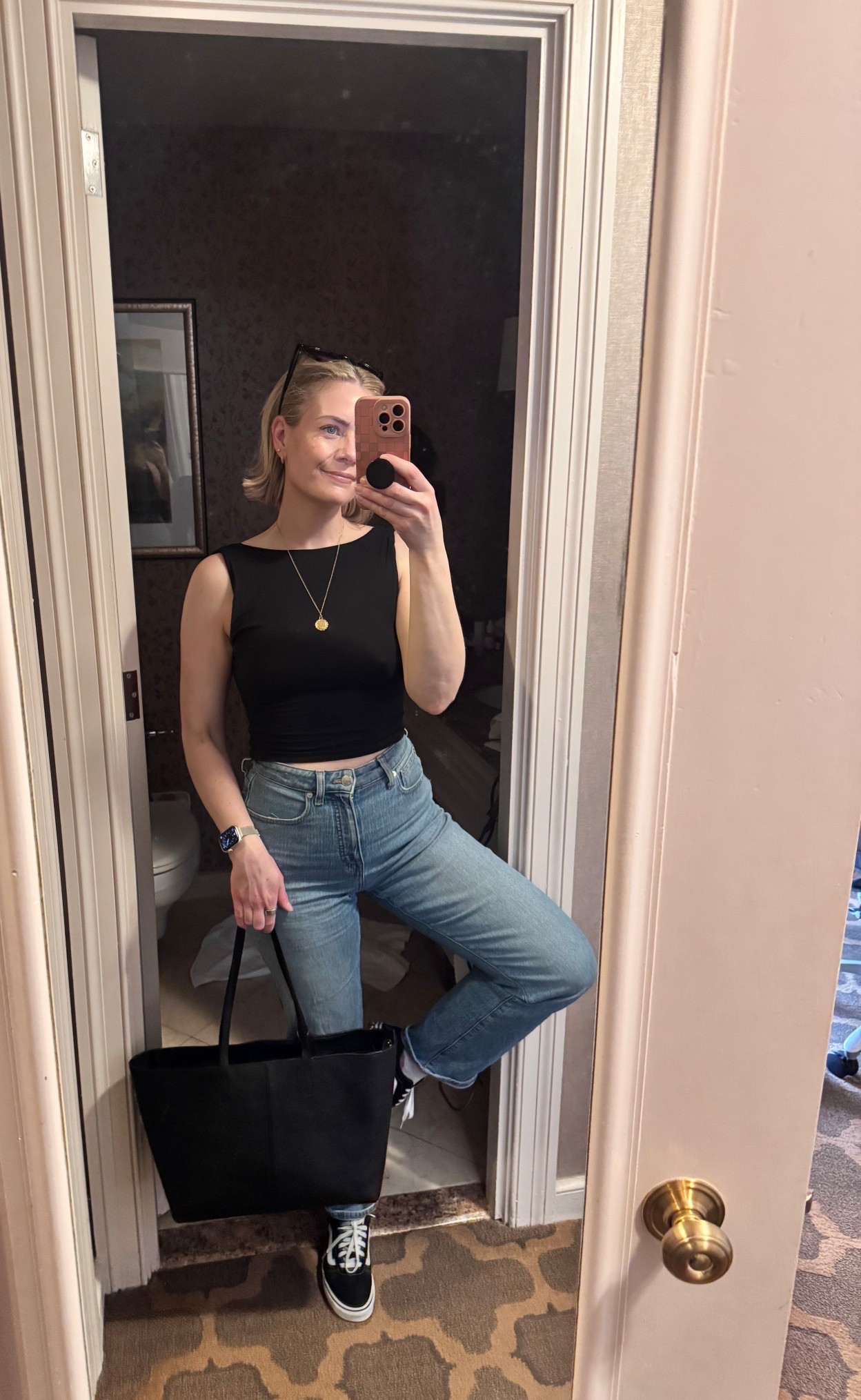 Britt’s new business woman bag. She was at her National Sales Meeting with her business woman job, and sent us photos of her outfits she wore. 
The jeans are Madewells 90s straight denim in curvy. This specific  version and wash are not available anymore but we found some similar options. She’s in a medium in the top (sized up) and a 26 in the denim  

#LTKootd #LTKWorkwear #LTKTravel