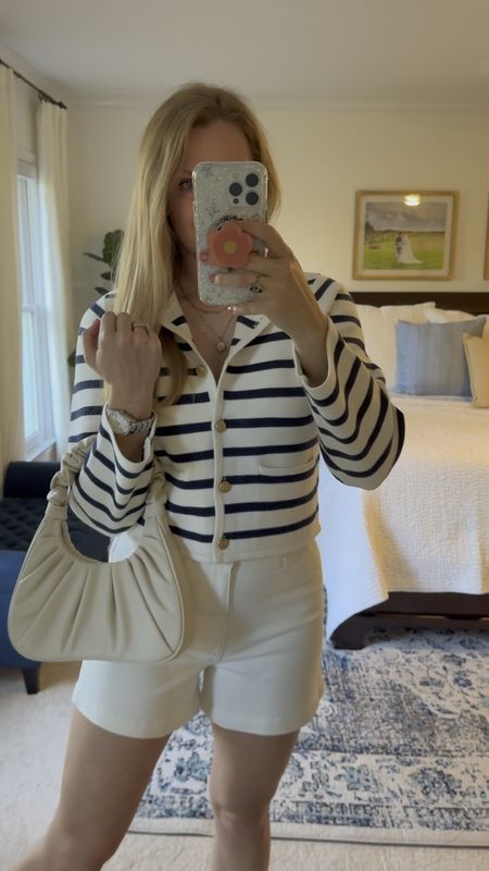 Striped sweater jacket styled for spring or a cool summer night.

Navy & white striped sweater jacket is very comfortable and soft. It fits true to size has functional buttons and pockets. Comes in solid colors as well. Currently 15% off!

White shorts are a cute summer staple. I got my normal soze

Wearing my normal size in the jacket and white shorts

#LTKfindsunder100 #LTKSeasonal #LTKstyletip
