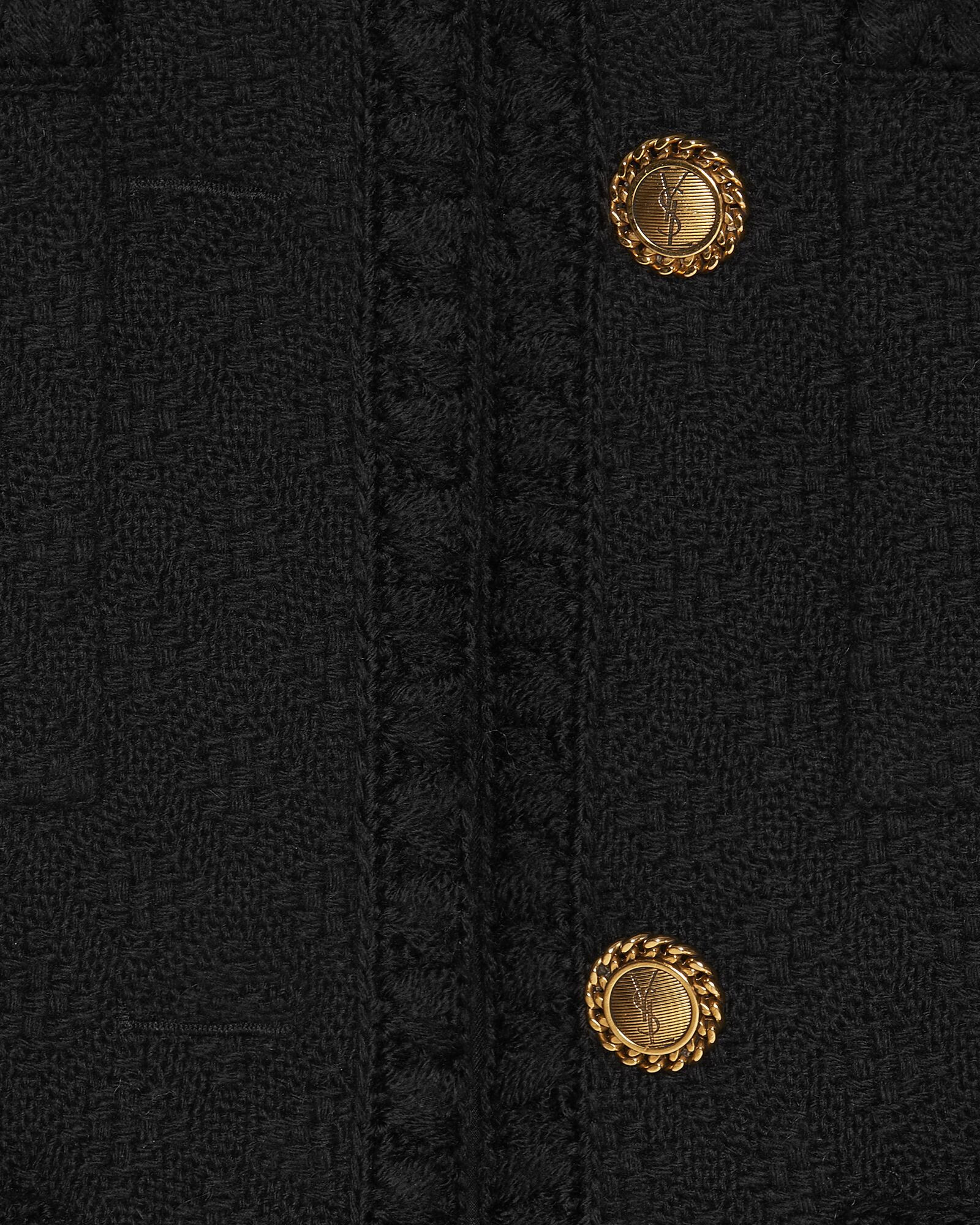 Short open jacket with a round-neck collar and featuring patch pockets with button closure, a bra... | Saint Laurent Inc. (Global)