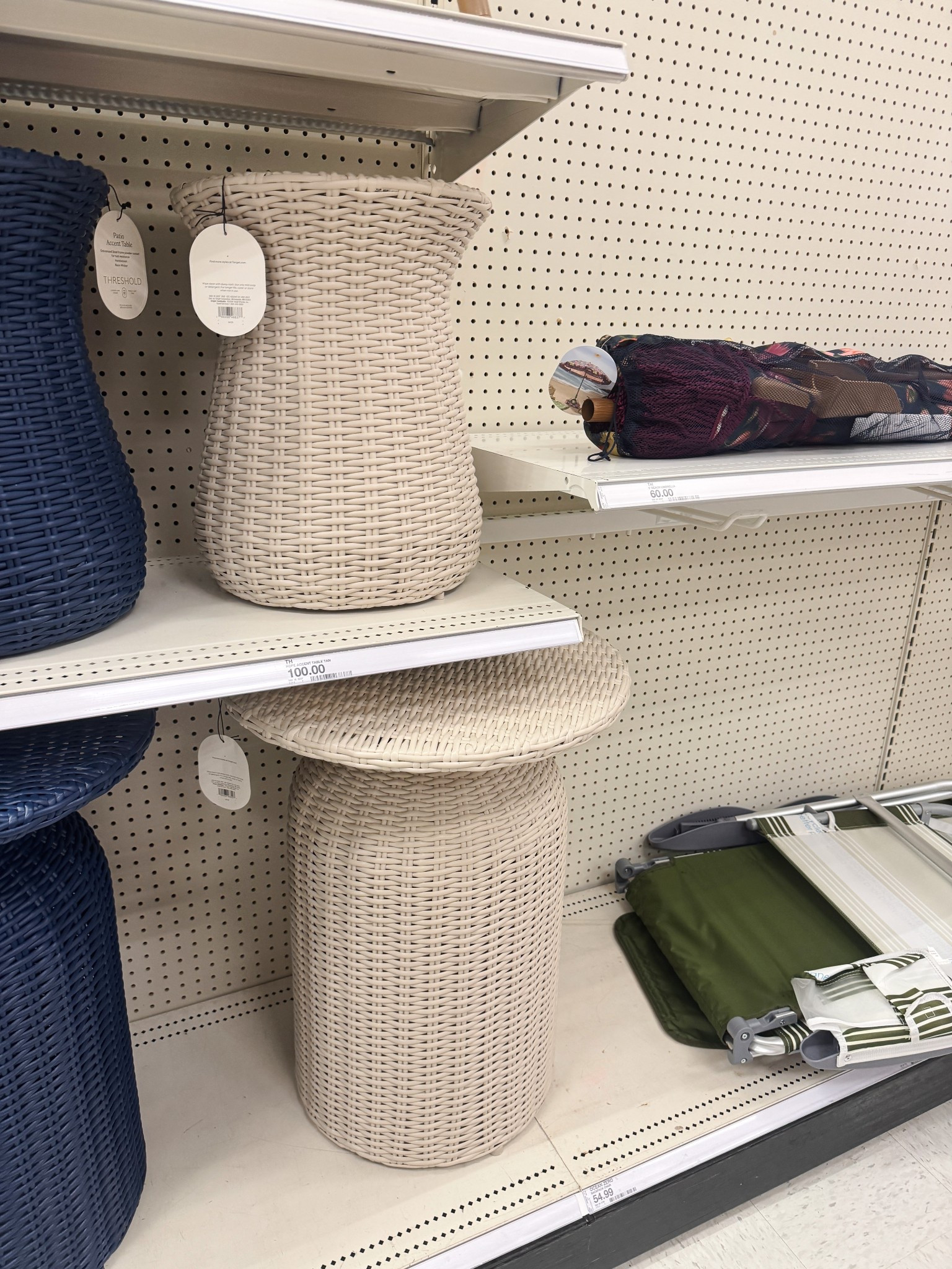 These outdoor pieces caught my eye from far away. The bottom one is a really nice size and looks high end. The online photo looks gray but I’d call these tan in person and my photo reflects that more 

#LTKHome #LTKSeasonal