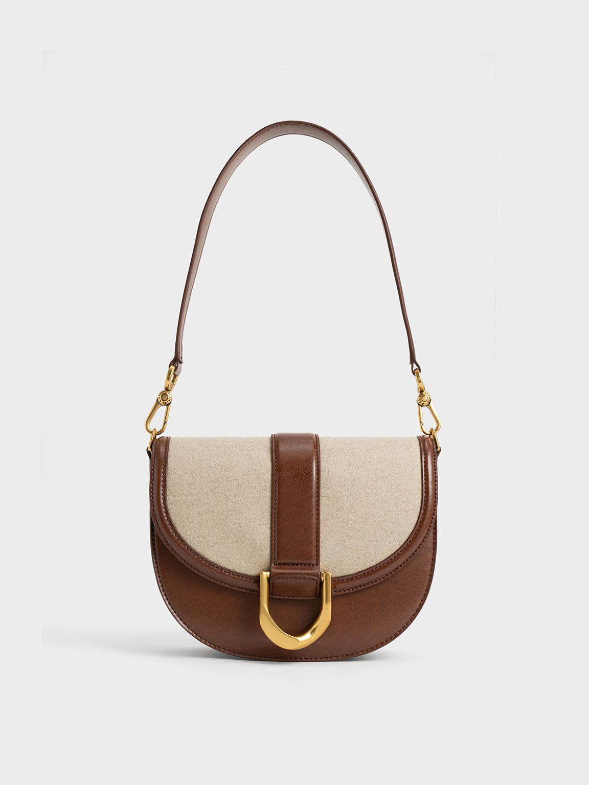 Chocolate Gabine Two-Tone Saddle Bag | CHARLES &amp; KEITH | Charles & Keith US