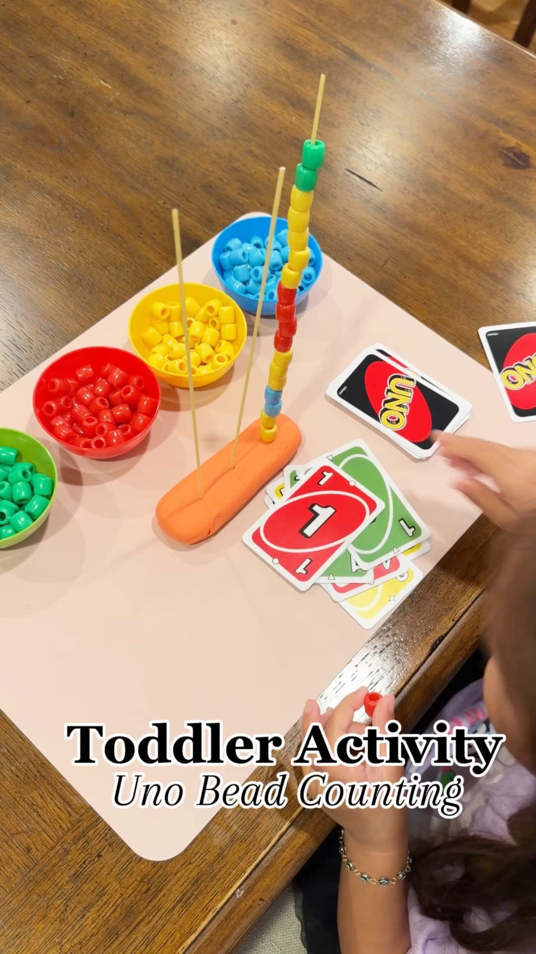 Comment UNO and I’ll send you this idea ♡

Such a fun (and easy!) way to work on colors, counting, and fine motor skills all in one activity 🎨

All you need:
• Playdough
• Dry spaghetti
• Colored beads
• UNO cards

Your child flips a card and adds the matching color + number of beads to the noodle — learning through play without even realizing it 💛

Save this for later and try it this week!

#LTKdayinmylife #LTKmomlife #LTKKids
