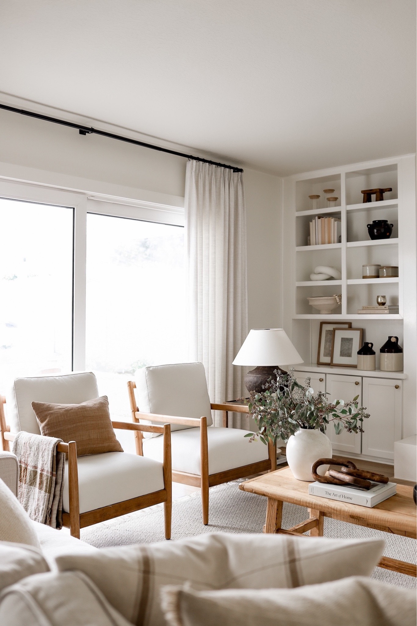 Shop our family room furniture and decor including these cute Target chairs and Amazon curtains! 

#LTKsalealert #LTKhome #LTKSeasonal