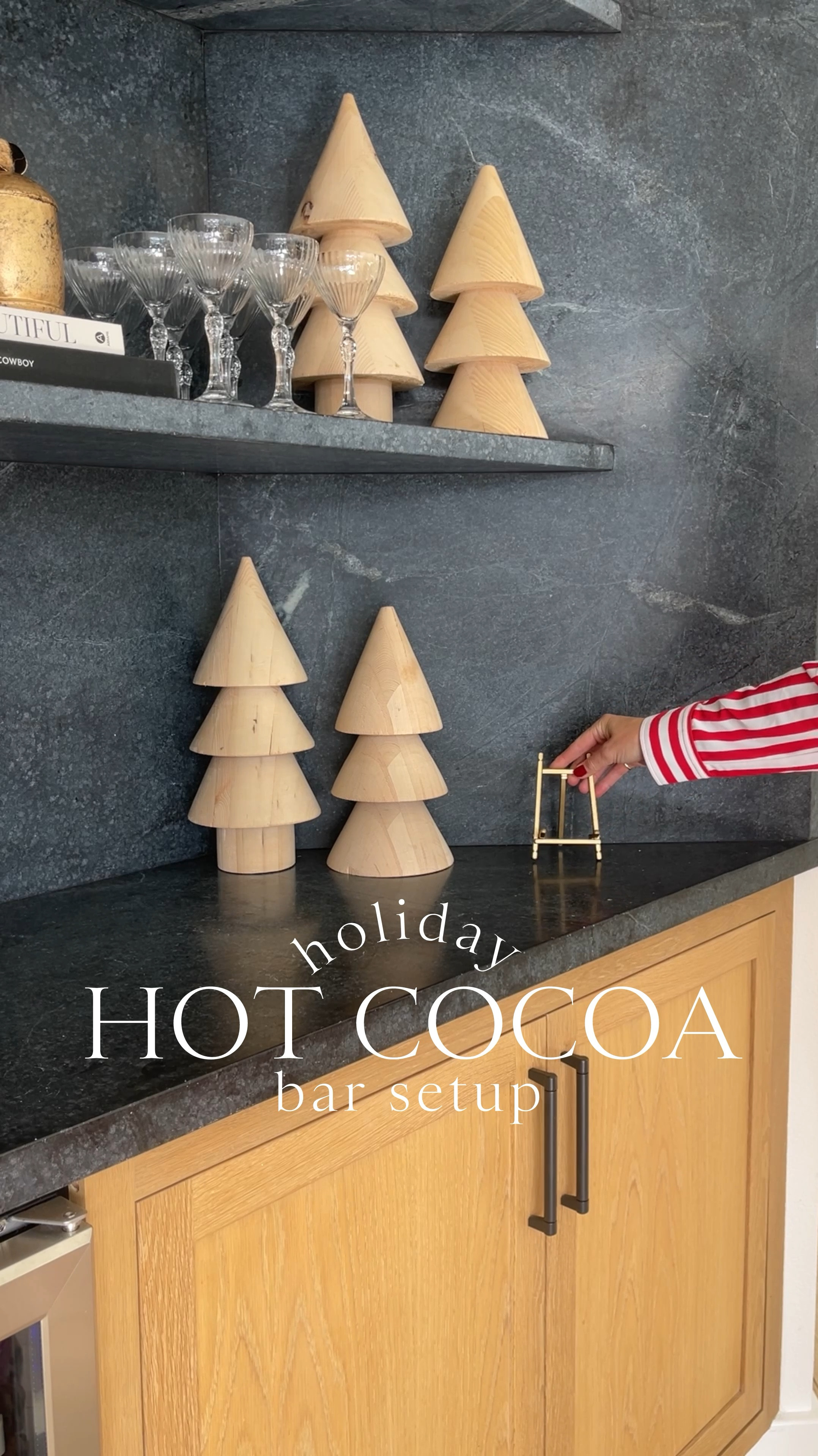 HOLIDAY \ hot cocoa bar setup for the winter season☕️🍫🌲 One of the family’s favorite sweet treats over the holidays so w/ not create a festive space with all the goods?! Styling with a few wood trees, cute sign, board, glass jars, custom label, stirrers, spoons and of course holiday mugs☕️  If you’re looking for homemade recipe that is easy and doesn’t have a ton of sugar and additives (like most packs), here’s mine👇🏻
+ 4 cups of milk
+ 4 tablespoons of cocoa powder
+ 3 teaspoons of maple syrup
+ 1 teaspoon of vanilla 

#LTKWatchNow #LTKHoliday #LTKHome