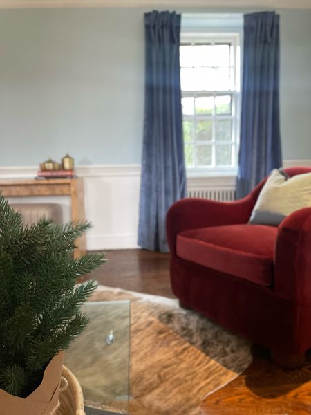 Bold Transitional living room design. Velvet armchair. Cb2 burl wood console table. Velvet drapes window treatments. Budget friendly. RoxyHetz home decor

#LTKsalealert #LTKhome #LTKunder100
