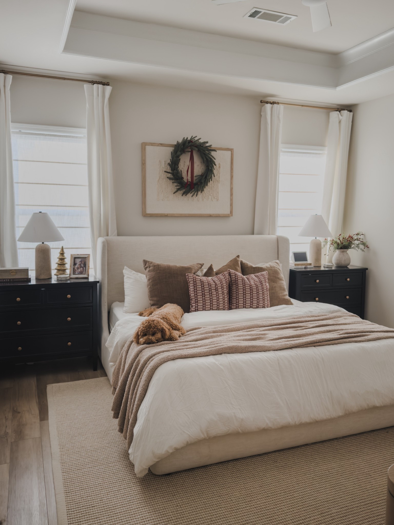 Light and airy primary bedroom styled with affordable furniture finds, faux greenery, pops of deep red and all sorts of texture! 

Wayfair finds, home inspo, bedroom style, Loloi, castlery, joss and main, half priced drapes, custom shades, shop the look! 

#LTKSeasonal #LTKHoliday #LTKHome