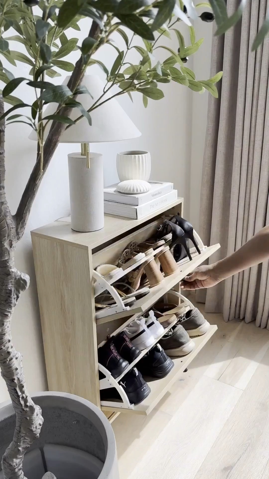 Double win! 🎉 Create an entryway that's both functional AND stylish! 💡 I'm obsessed with these slim stage cabinets - only 9 inches deep and 23 inches wide, making them perfect for cozy entryways. Plus, you can place them next to each other to create more space! 🎉 The best part? You can store your shoes sideways or forwards, whatever works best for you! 👠👡#LTKStyleTip



#LTKHome #LTKSaleAlert