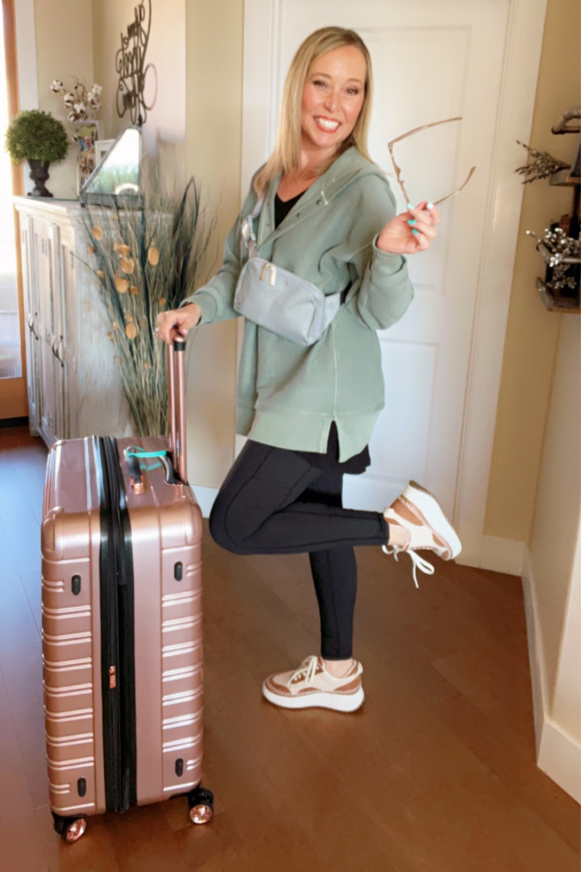 Travel Outfit 🌟
Day one is a road trip. Wearing my favorite pocket leggings and textured pullover snap hoodie both from Aerie! 
Tunic tank and sunglasses from Amazon
Cushioned comfortable trending sneakers from Target
Lululemon belt bag for hands free travel 
Hard side spinner suitcase luggage from iFly 

#LTKstyletip #LTKshoecrush #LTKtravel