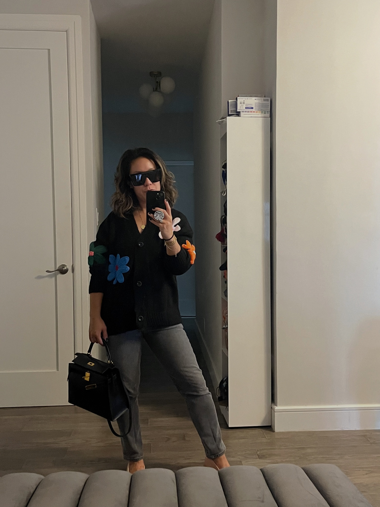 Sweater weather. Love a button down cardigan. Love the pop of color in the flowers. Very soft. Oversized. I’m wearing a small. Jeans are a 26. Accessories are the splurge. What are you wearing on the colder days?

#LTKFindsUnder50 #LTKFindsUnder100 #LTKCyberWeek