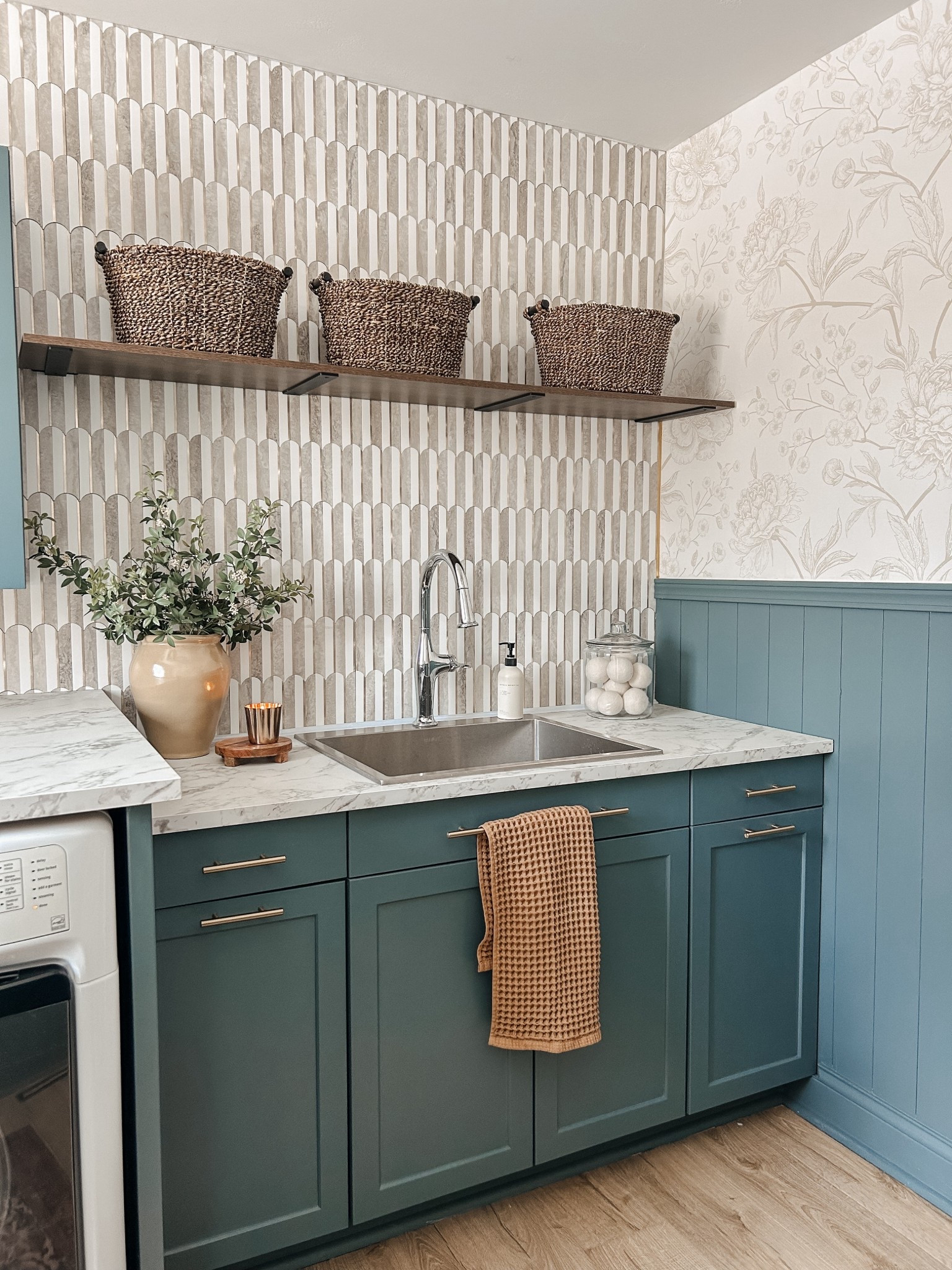 An “island depth” laminate countertop from IKEA is wide enough to go over your washer and dryer! 

We love the peel and stick tiles we used in here 💙 Really simple DIY! 

Paint color is “Slate tile” by SW

#LTKSaleAlert #LTKHome #LTKdayinmylife