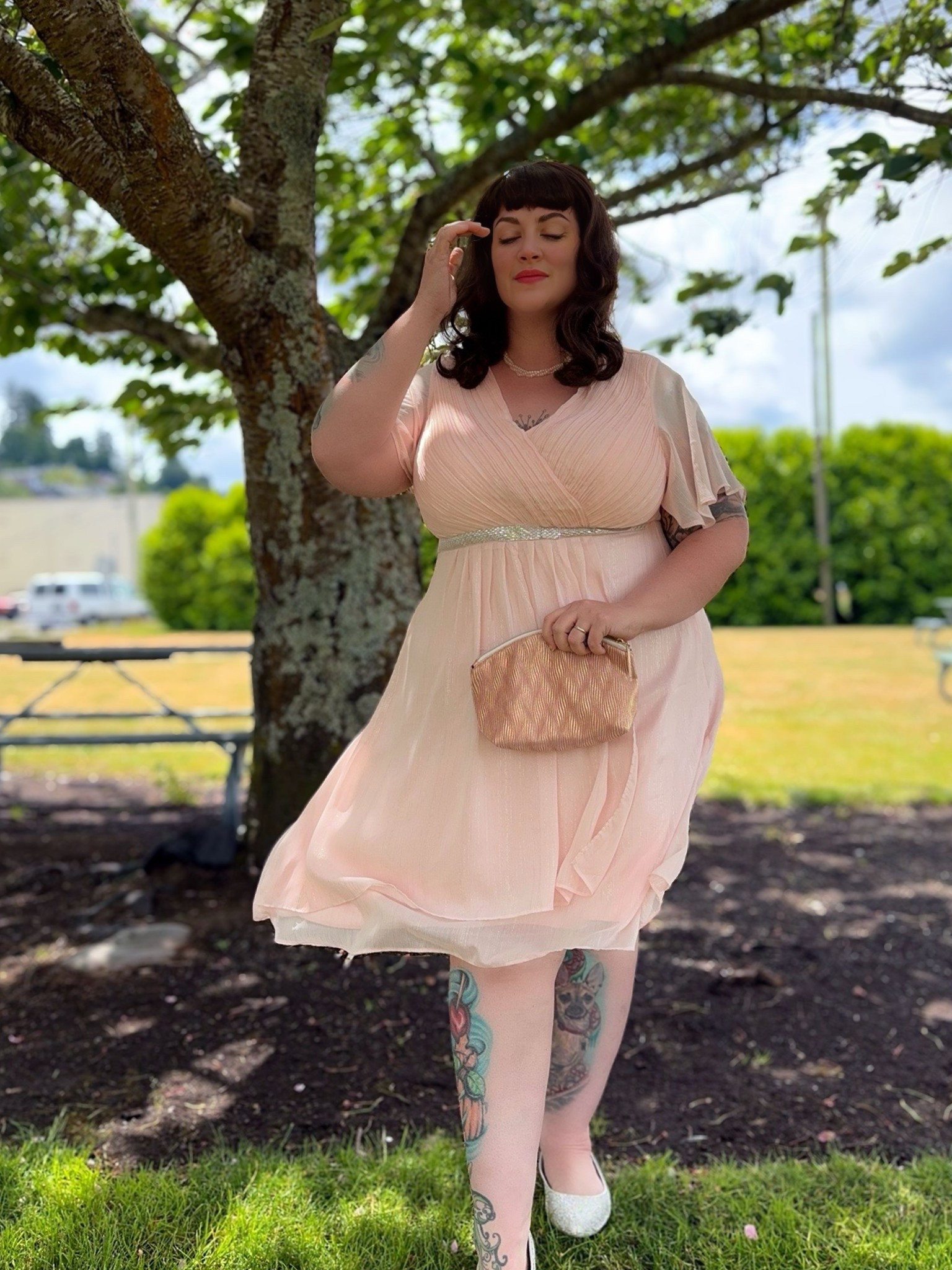 Plus size dress in peachy pink chiffon with pleated bodice and attached beaded belt

#LTKWedding #LTKPlusSize #LTKFindsUnder50