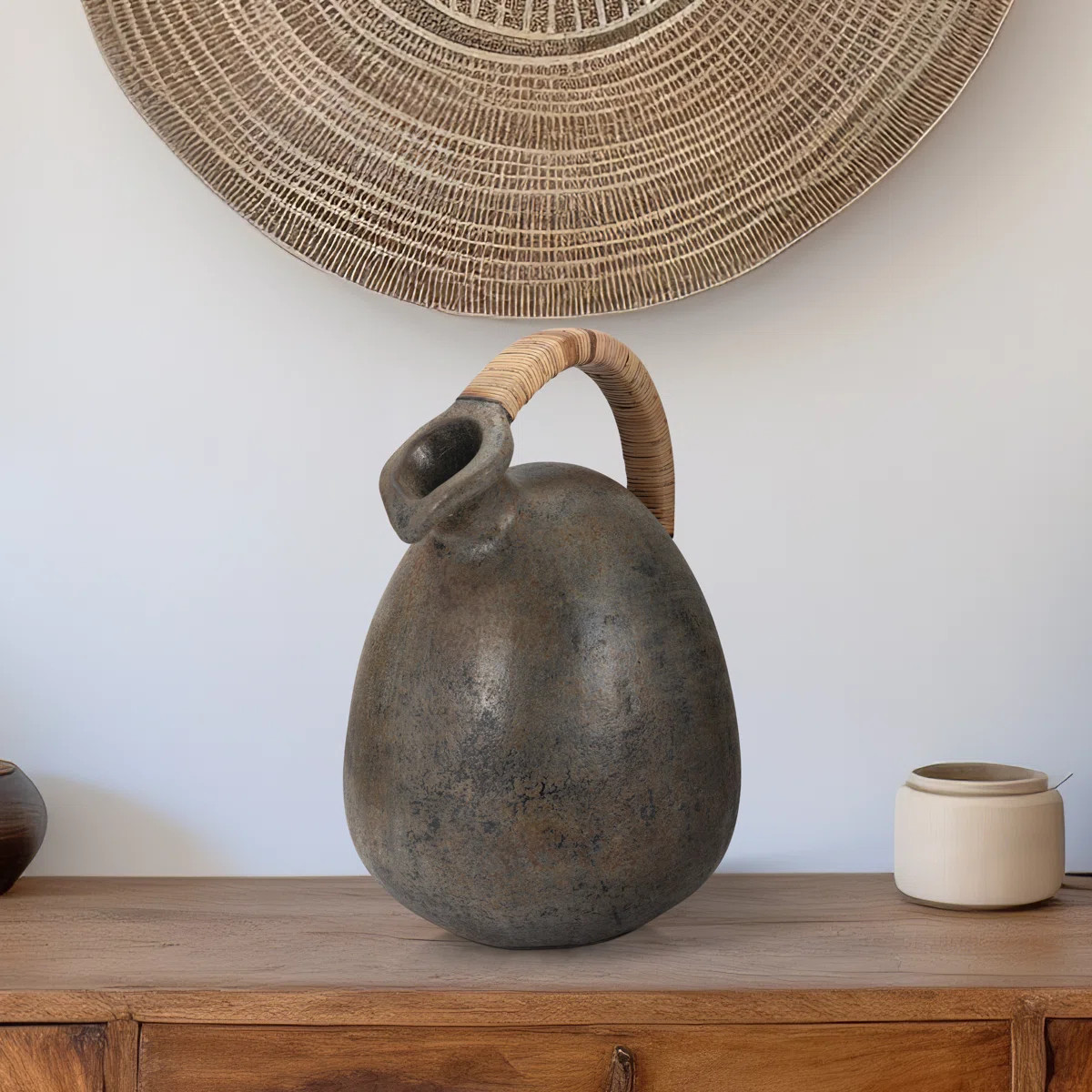 Decorative Terracotta Vase with Sculpted Form, Tilted Mouth, Matte Pottery Texture, and Woven Rat... | Wayfair North America