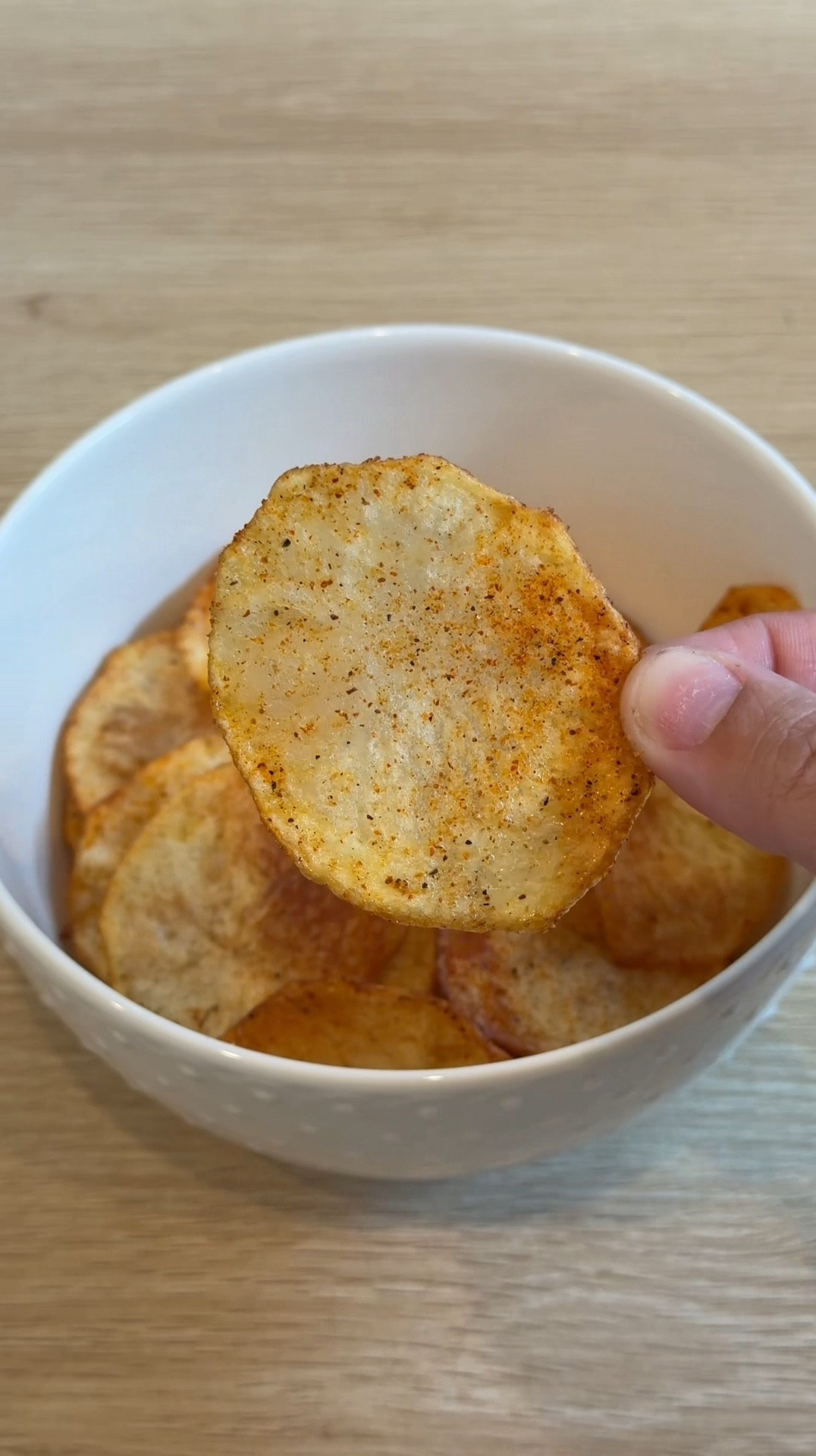 Crispy homemade potato chips made easy with a mandoline slicer 🥔✨

Ingredients:

* 2–3 large russet potatoes
* Cold water (for soaking)
* Vegetable oil (for frying)
* Salt (to taste)
* Optional: garlic powder, paprika, black pepper, ranch seasoning

👩‍🍳 Directions:

1. Slice the potatoes
    Use your mandoline slicer to cut the potatoes into very thin, even slices.
2. Soak the slices
    Place slices in a bowl of cold water for 20–30 minutes to remove excess starch (this makes them crispier).
3. Dry completely
    Drain and pat the potato slices dry with paper towels this step is key for crispy chips.
4. Heat the oil
    Heat vegetable oil in a deep pan to about 350°F.
5. Fry in batches
    Carefully add potato slices in small batches. Fry for 2–4 minutes or until golden and crispy.
6. Drain & season
    Remove chips and place on paper towels. Sprinkle with salt and any seasoning while still hot.
7. Cool & enjoy
    Let them cool slightly they’ll crisp up even more!

#homemadechips
#kitchenhacks
#easyrecipes

#LTKfoodie #LTKHome