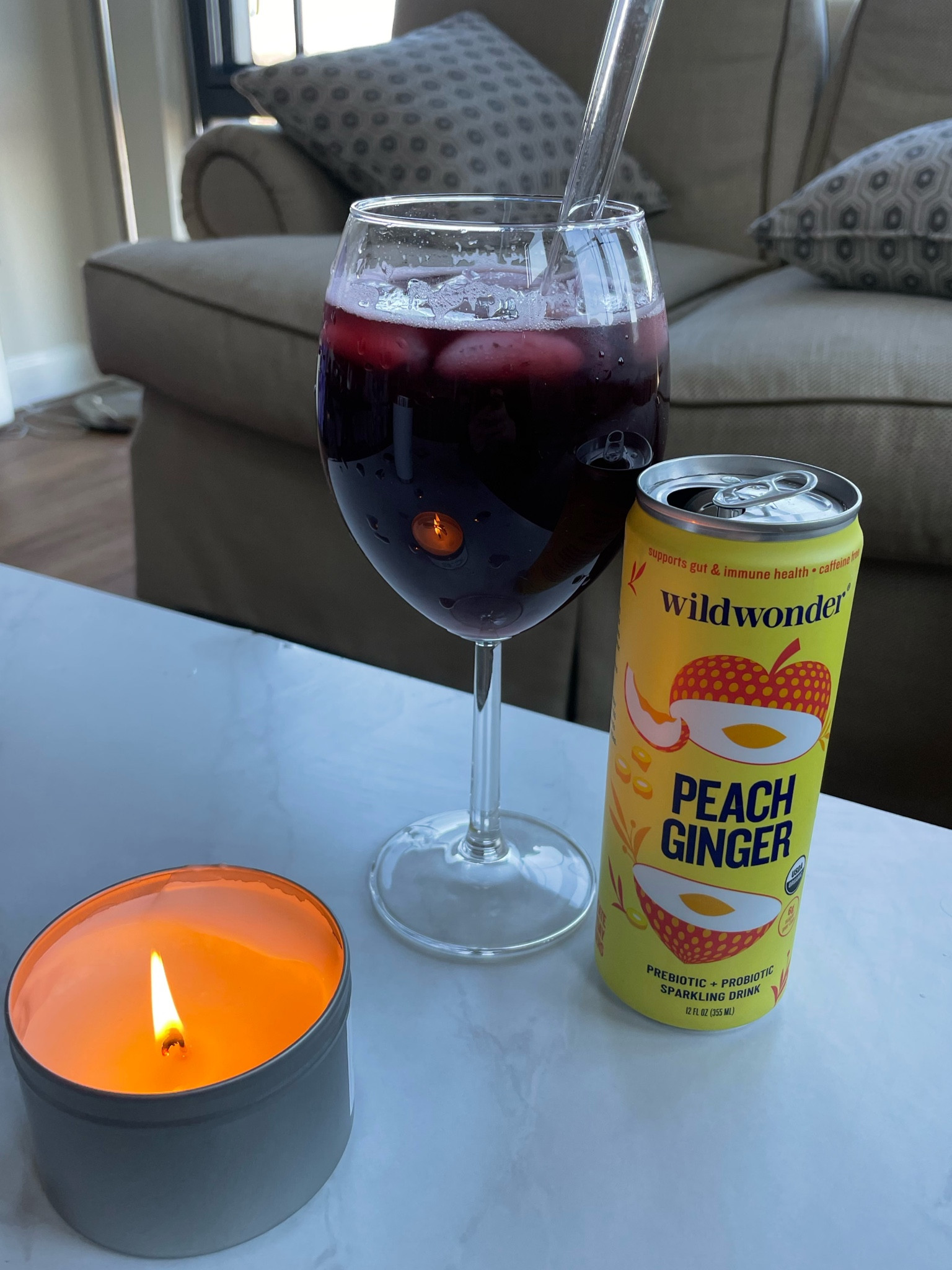 Wildwonder prebiotic/probiotic sparkling drink & tart cherry juice🍒 The best drink!! And trader joes candle of course.