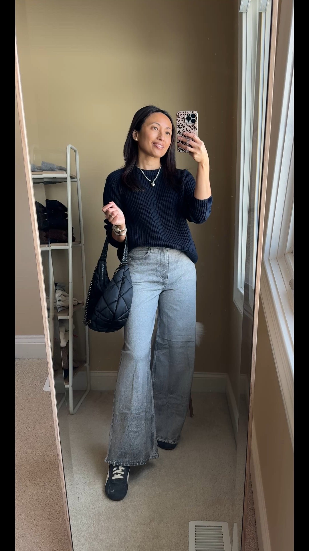 What to wear with navy. (Besides blue jeans.)
This sweater (a good classic in all cotton) is the only piece of navy clothing that I have. And I was looking for other things to wear with it besides jeans. 
1) brown + gold: warm tone combo
2) gray + silver: cool tone combo 
3) black + dressy accessories: edgy chic
4) color + neutral details: classic preppy
Exact sweater- size up. 
Brown trouser pants on sale- true to size. 
Gray sweatpant jeans- true to size. 
Black barrel pants- size down  

#LTKootd #LTKSaleAlert #LTKOver40