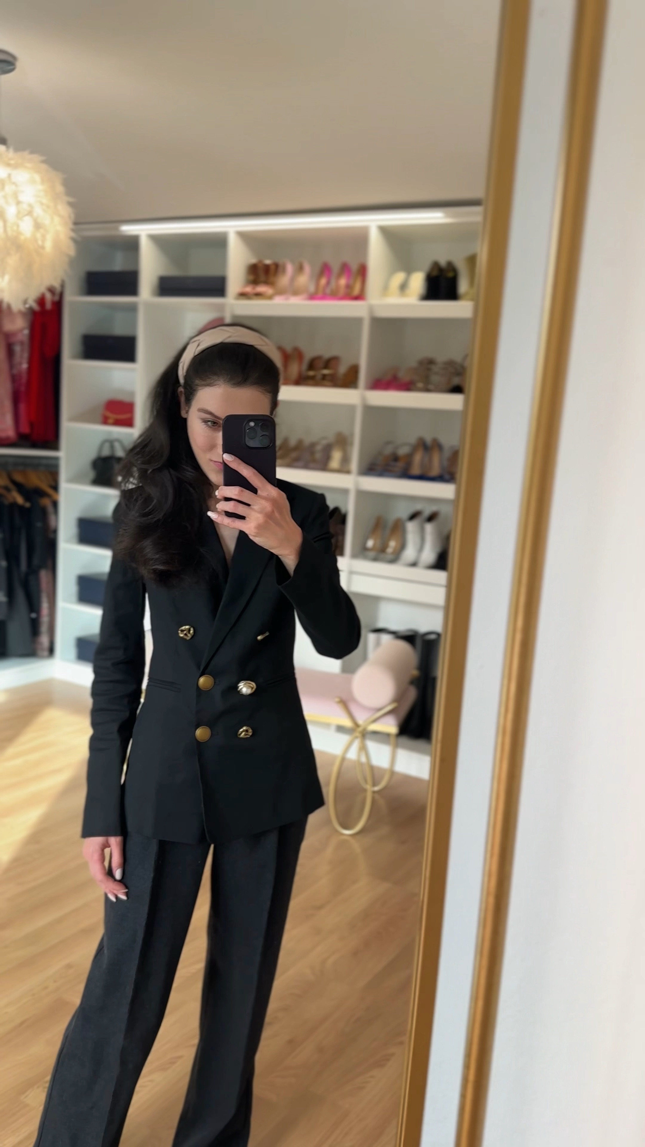 Power through your workday in sophisticated style! This look embodies the perfect blend of spring work outfit trends and timeless business formal attire. Obsessed with the modern silhouette of this pantsuit – the fitted double-breasted blazer paired with wide-leg grey pants creates a striking and powerful look. The pop of color with the headband adds a touch of personality, while the black Malone Souliers flat mules elevate the entire outfit. This look is perfect for important meetings, or simply commanding the room with confidence. #springworkoutfit #springofficeoutfits #blackblazeroutfit #workwear #springworkoutfitforwomen #outfitideasspring #businessformal #LTKspring #LTKsale #workoutfit 

#LTKworkwear #LTKVideo