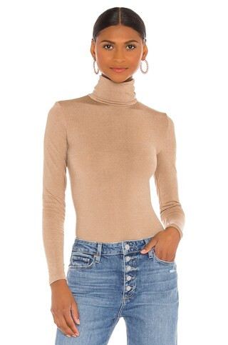 Colorado String Bodysuit
                    
                    Wolford | Revolve Clothing (Global)