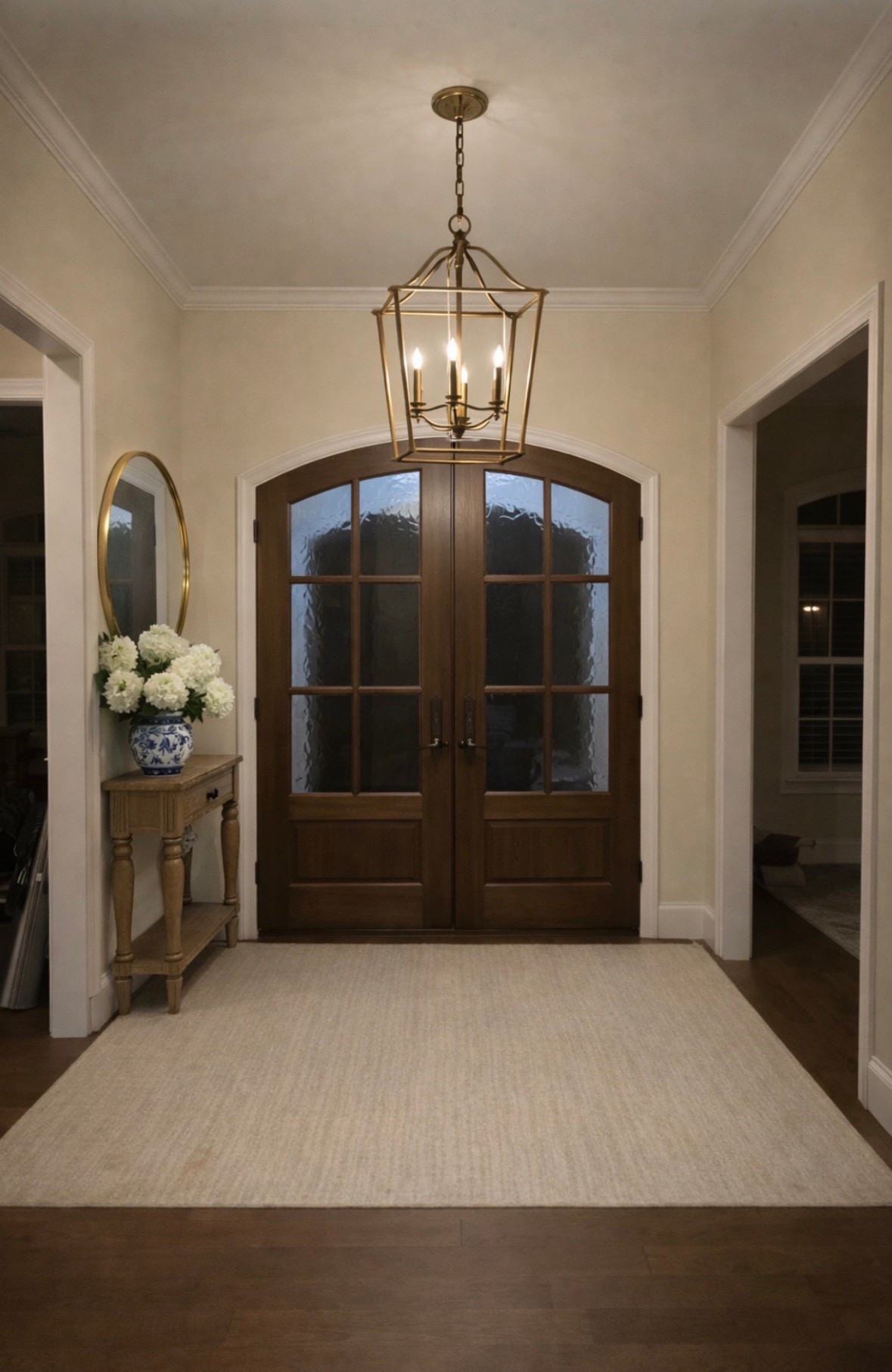 A welcoming entryway sets the tone for the entire home
Soft neutral walls, warm wood doors, a classic lantern, and a simple rug create an inviting first impression that feels timeless and refined.

Everything linked here perfect inspiration for an elegant but approachable foyer.

#LTKhome #EntrywayInspo #NeutralHome #ClassicDesign #FoyerDecor #NancyMeyersInspired